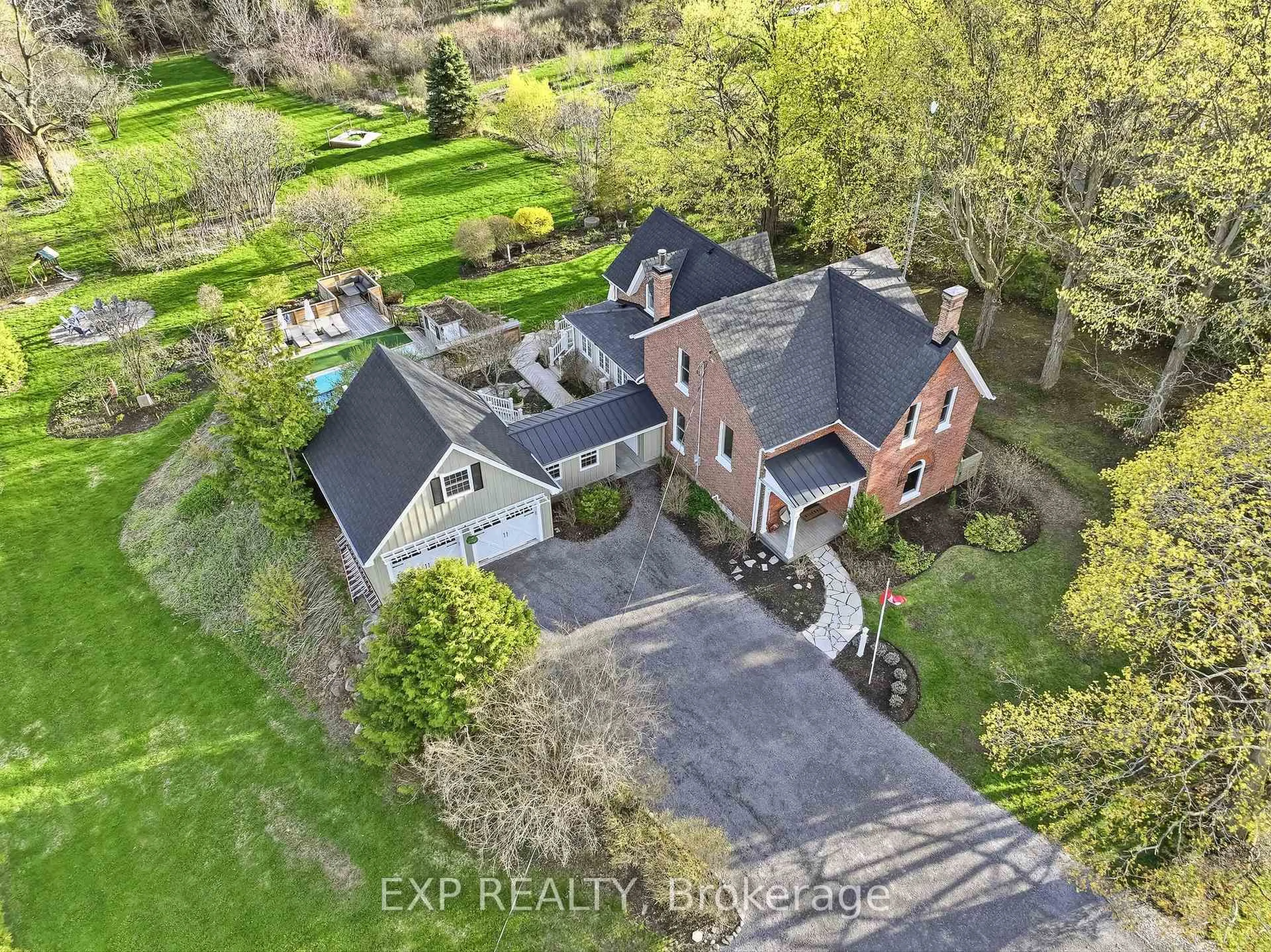 A pic from outside/outdoor area/front of a property/back of a property/a pic from drone, street for 7823 Bickle Hill Rd, Hamilton Township Ontario K9A 4J7