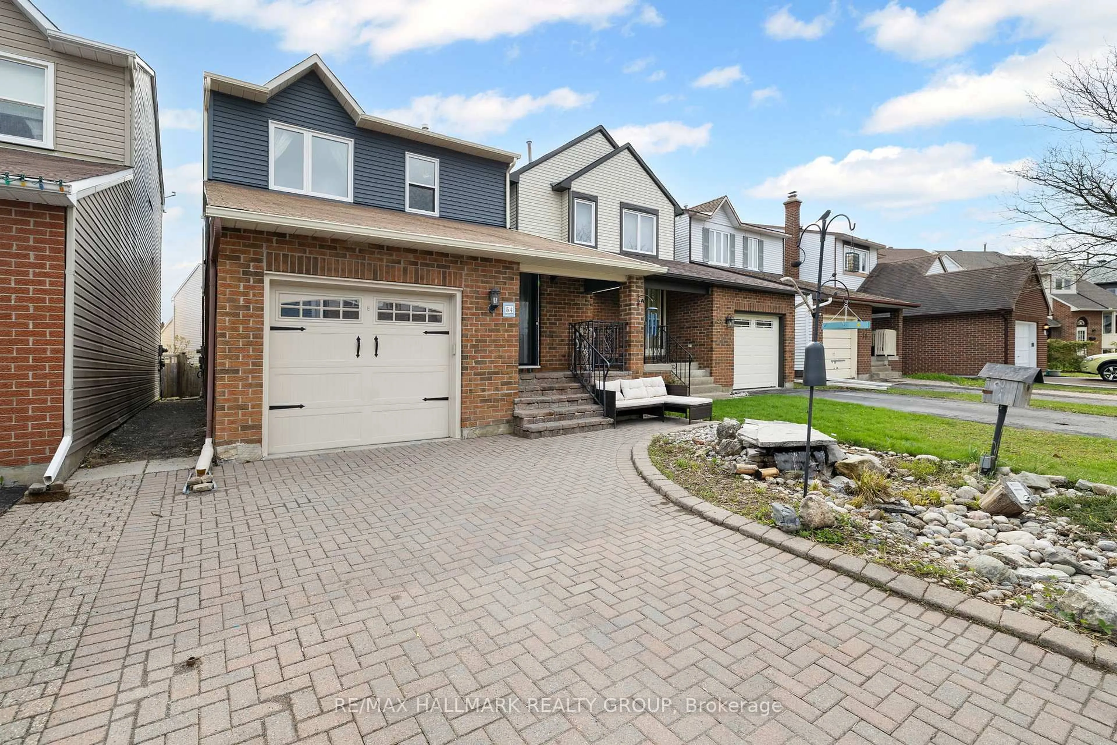 Home with brick exterior material, street for 54 Fireside Cres, Ottawa Ontario K1T 1Z4