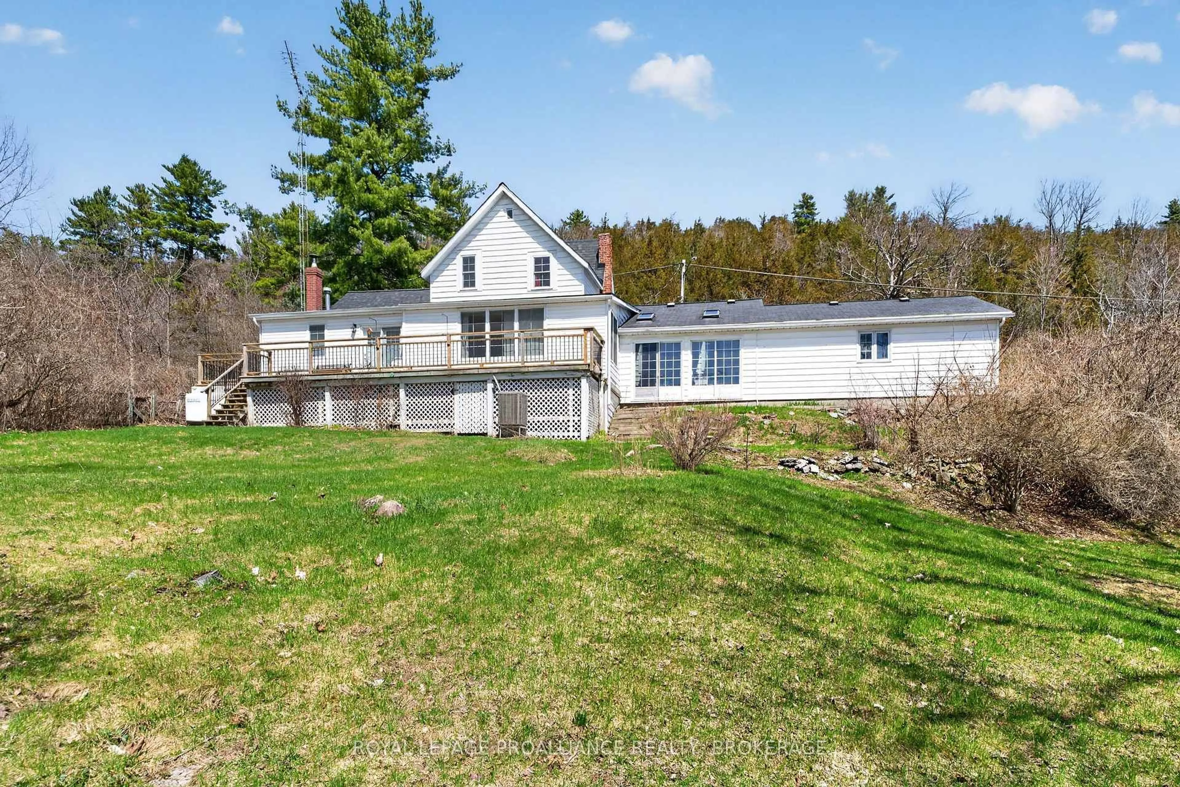 A pic from outside/outdoor area/front of a property/back of a property/a pic from drone, water/lake/river/ocean view for 1 Pond St, Westport Ontario K0G 1X0