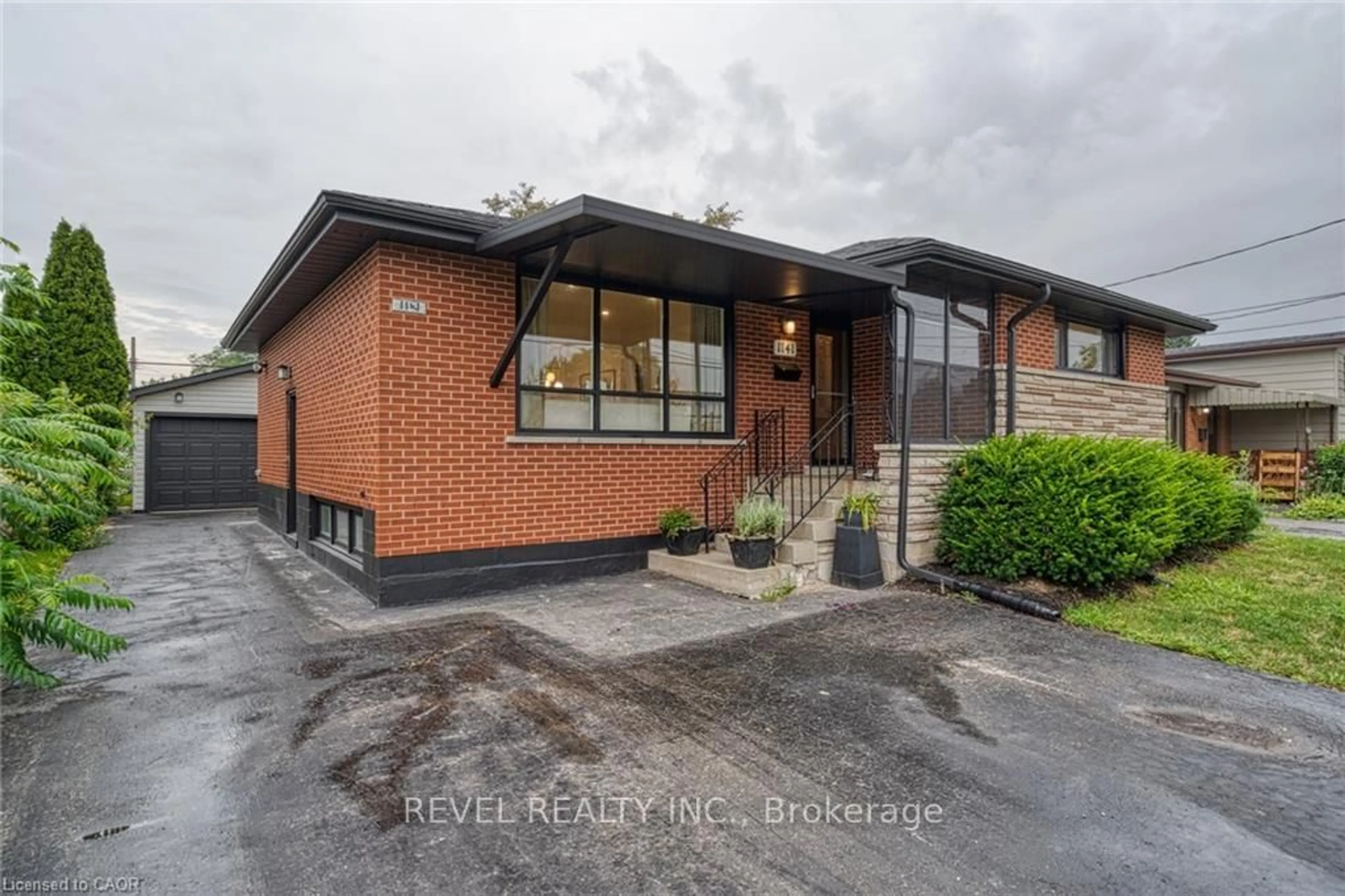Home with brick exterior material, unknown for 1141 Mohawk Rd, Hamilton Ontario L8T 2S4