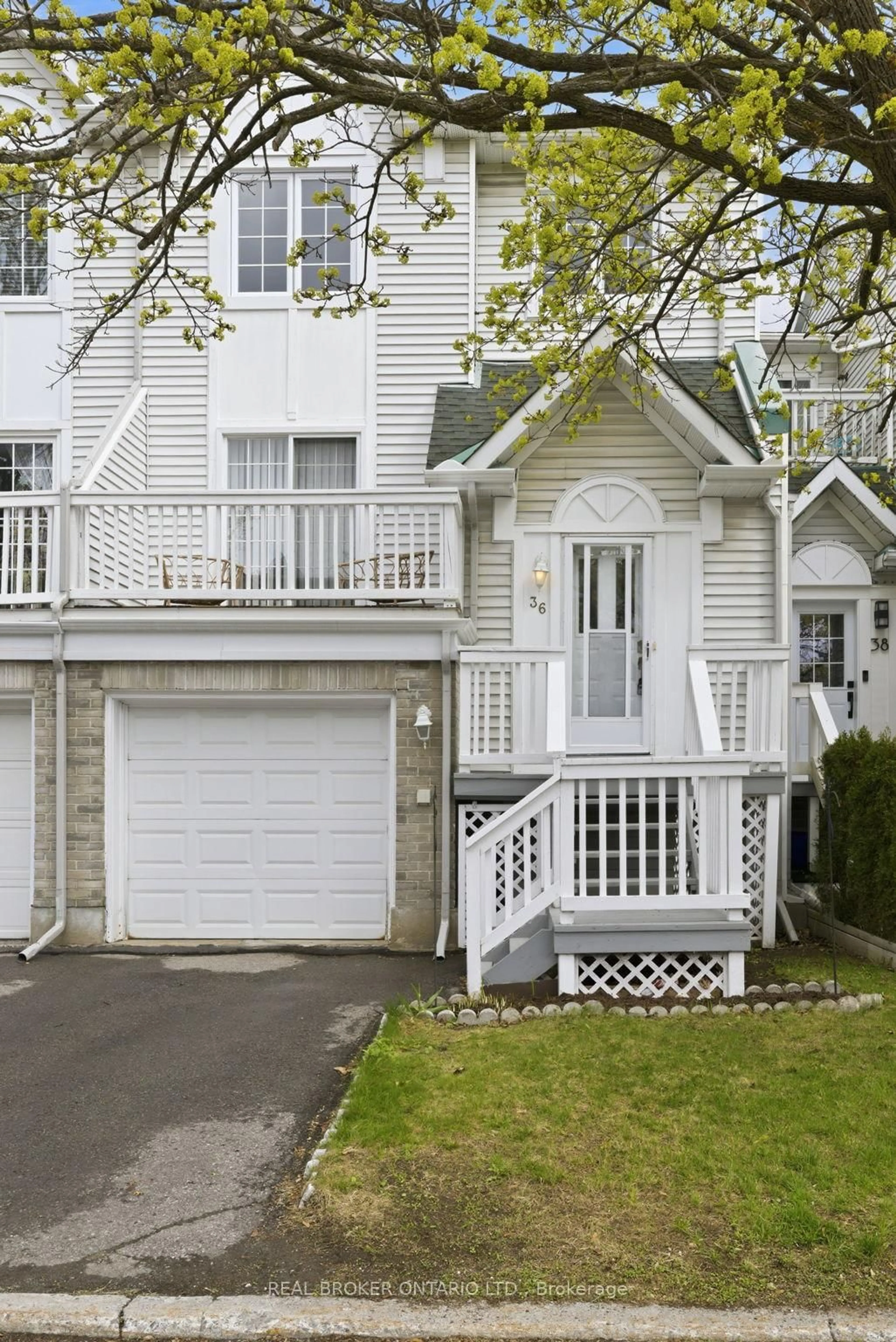 Home with vinyl exterior material, street for 36 Castlegreen Private, Ottawa Ontario K1T 3N4