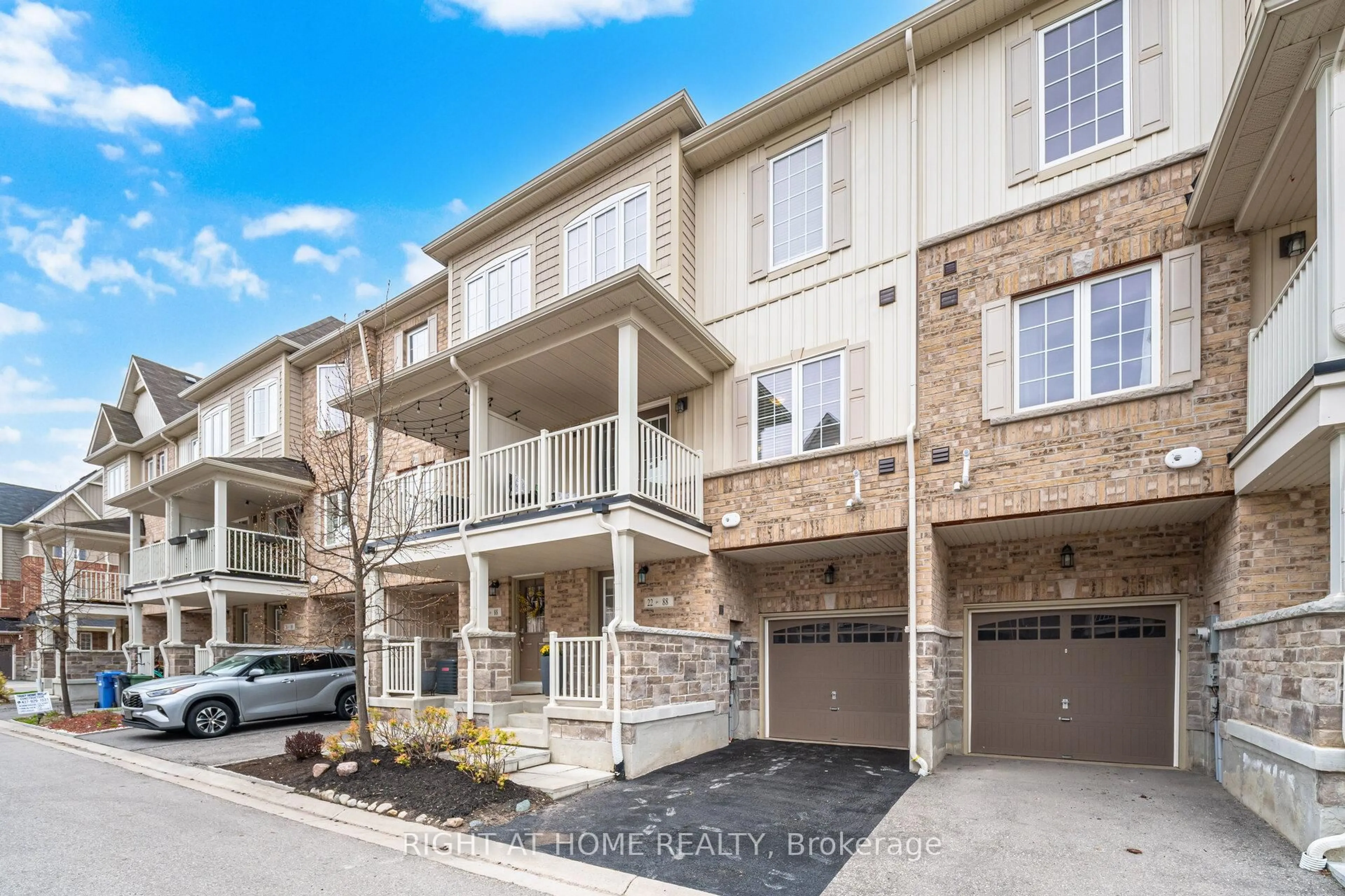 A pic from outside/outdoor area/front of a property/back of a property/a pic from drone, street for 88 Decorso Dr #22, Guelph Ontario N1L 0A9