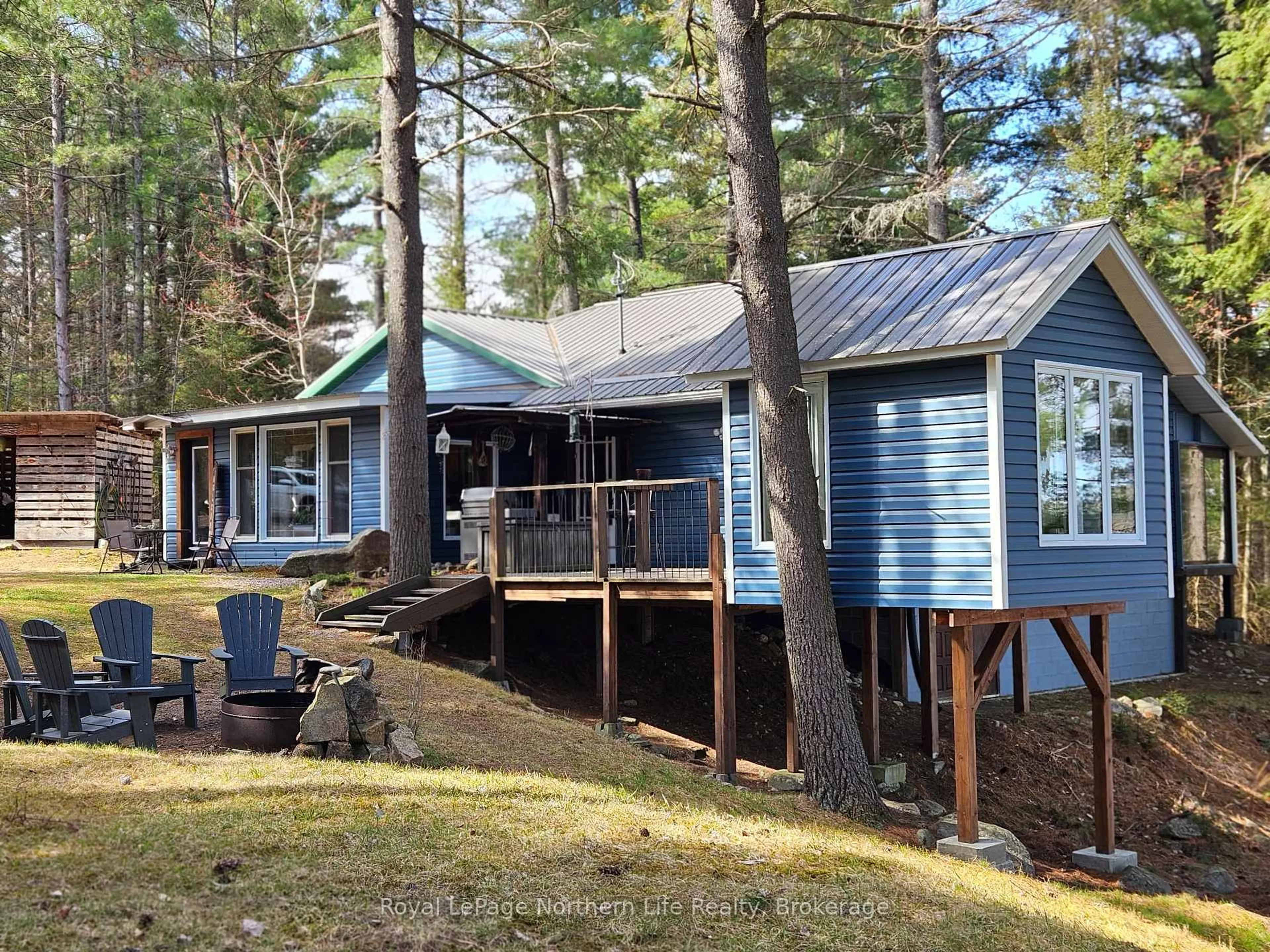 A pic from outside/outdoor area/front of a property/back of a property/a pic from drone, unknown for 170 TALON LAKE Rd, Calvin Ontario P0H 2E0