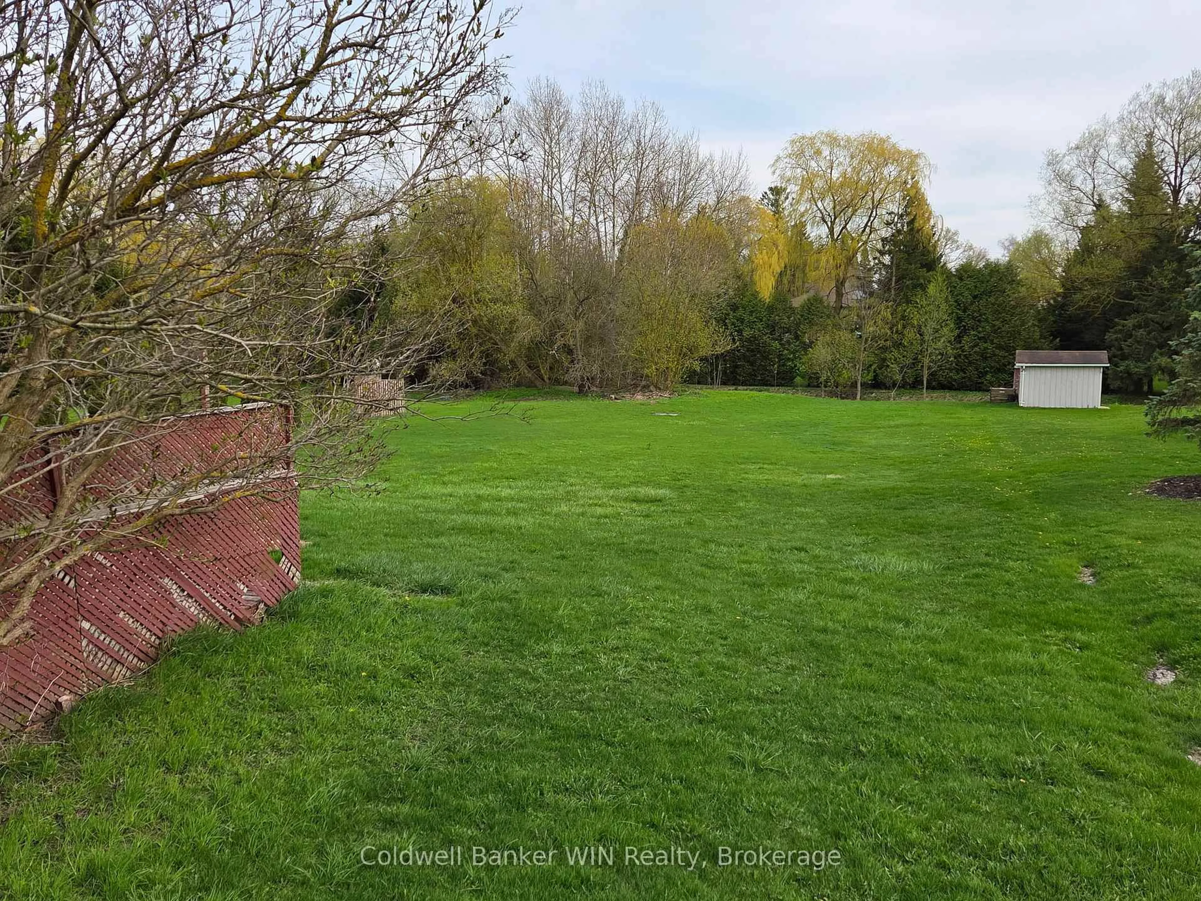 A pic from outside/outdoor area/front of a property/back of a property/a pic from drone, forest/trees view for 456 Queen St, Wellington North Ontario N0G 2L3