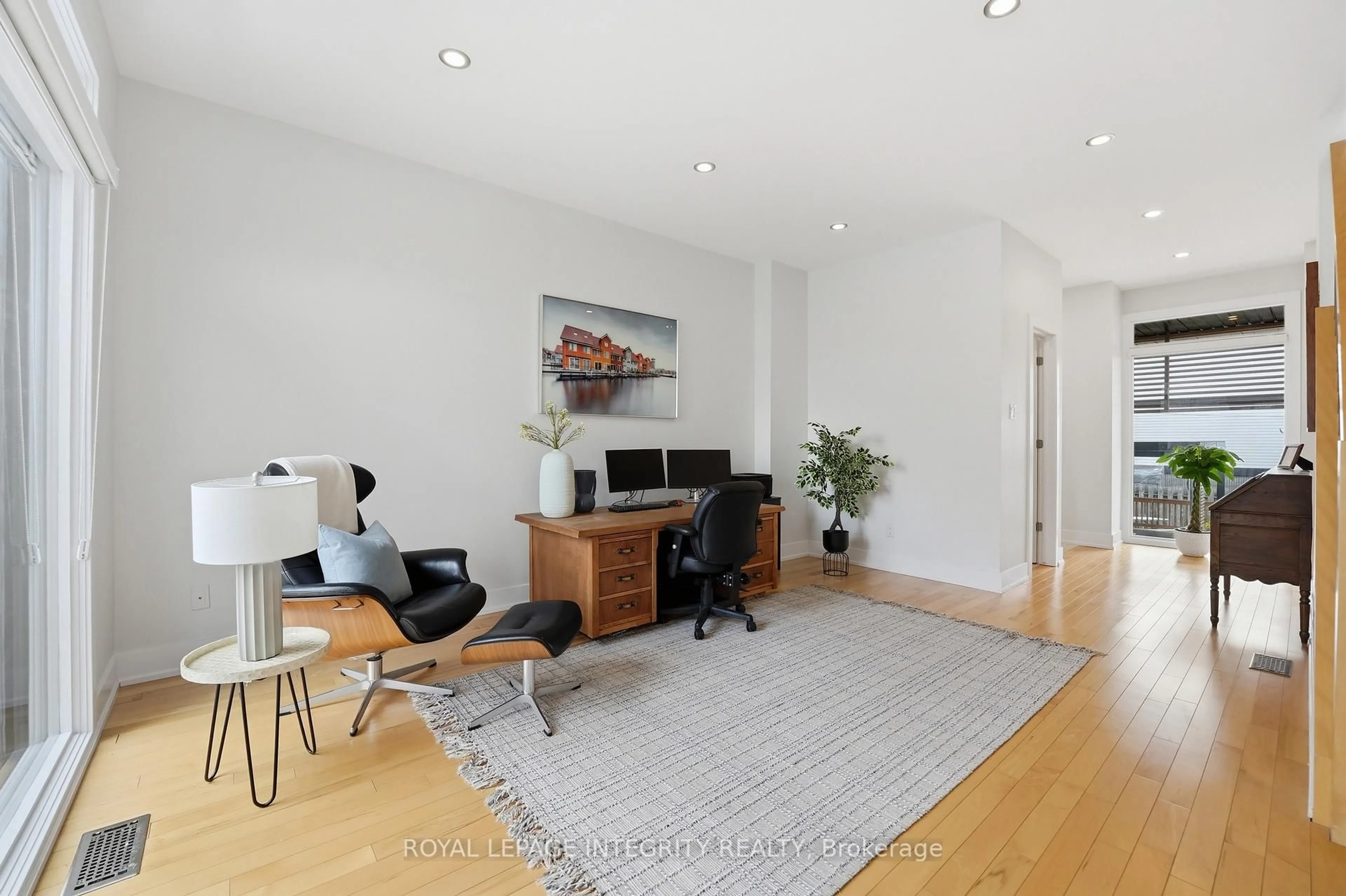 Living room with furniture, wood/laminate floor for 37E Ladouceur St, Ottawa Ontario K1Y 2S9