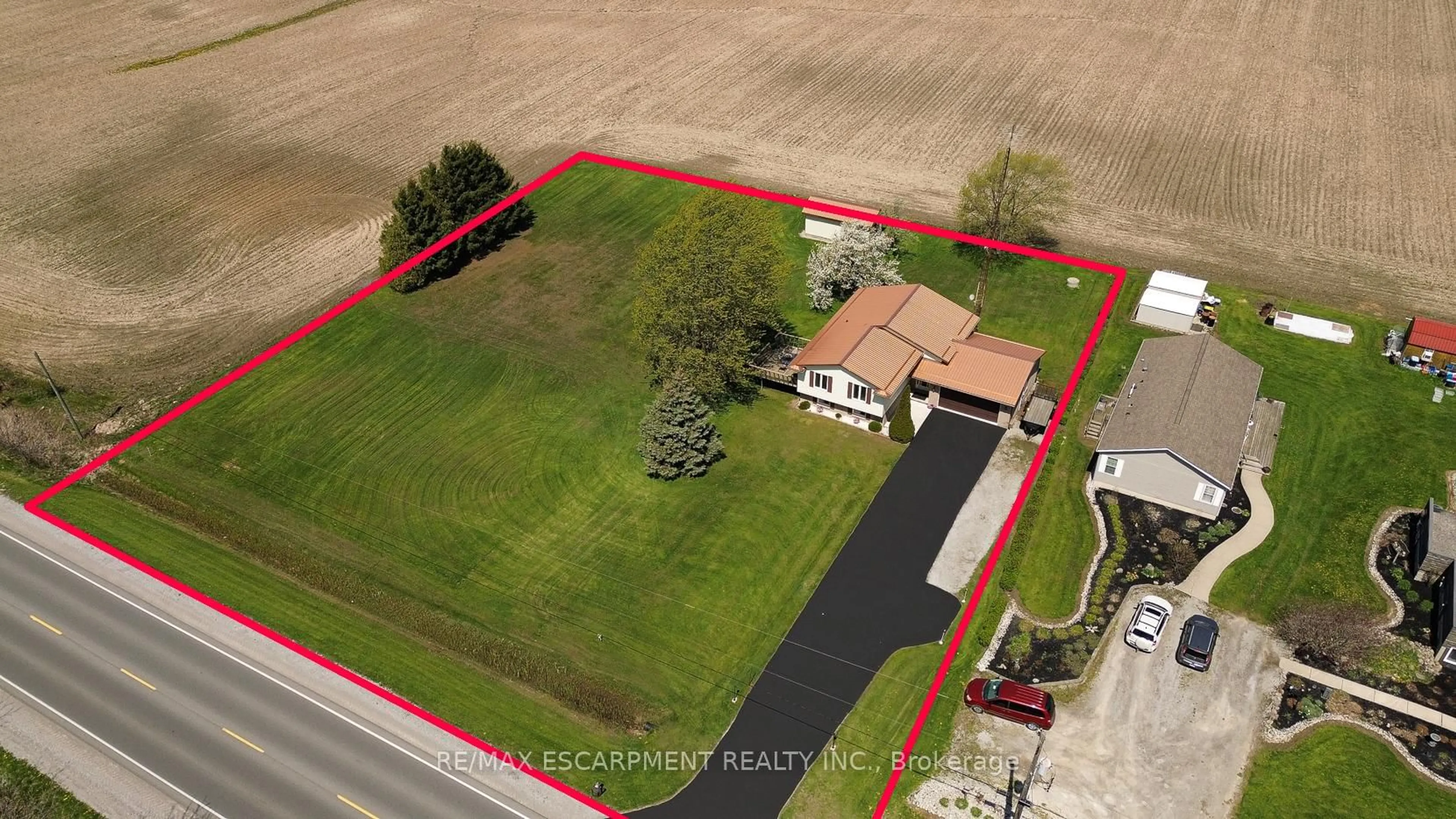 A pic from outside/outdoor area/front of a property/back of a property/a pic from drone, street for 4617 Highway 3, Norfolk Ontario N3Y 4K4