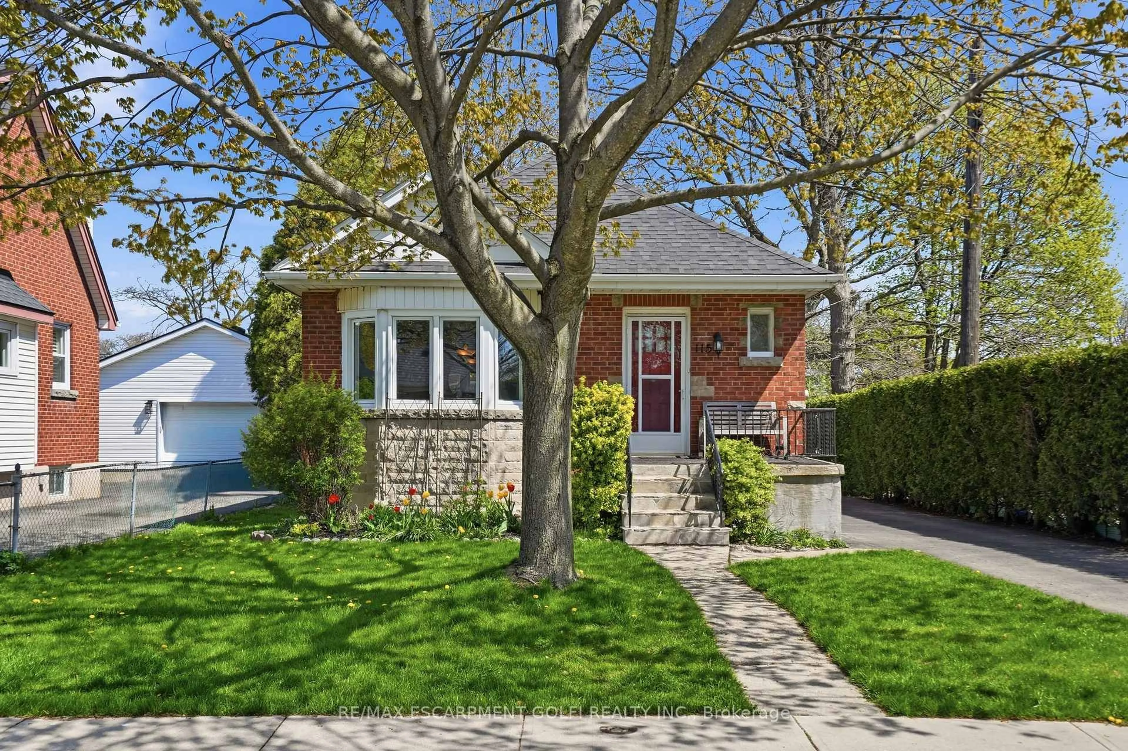 Home with brick exterior material, street for 115 Empress Ave, Hamilton Ontario L9A 1M5