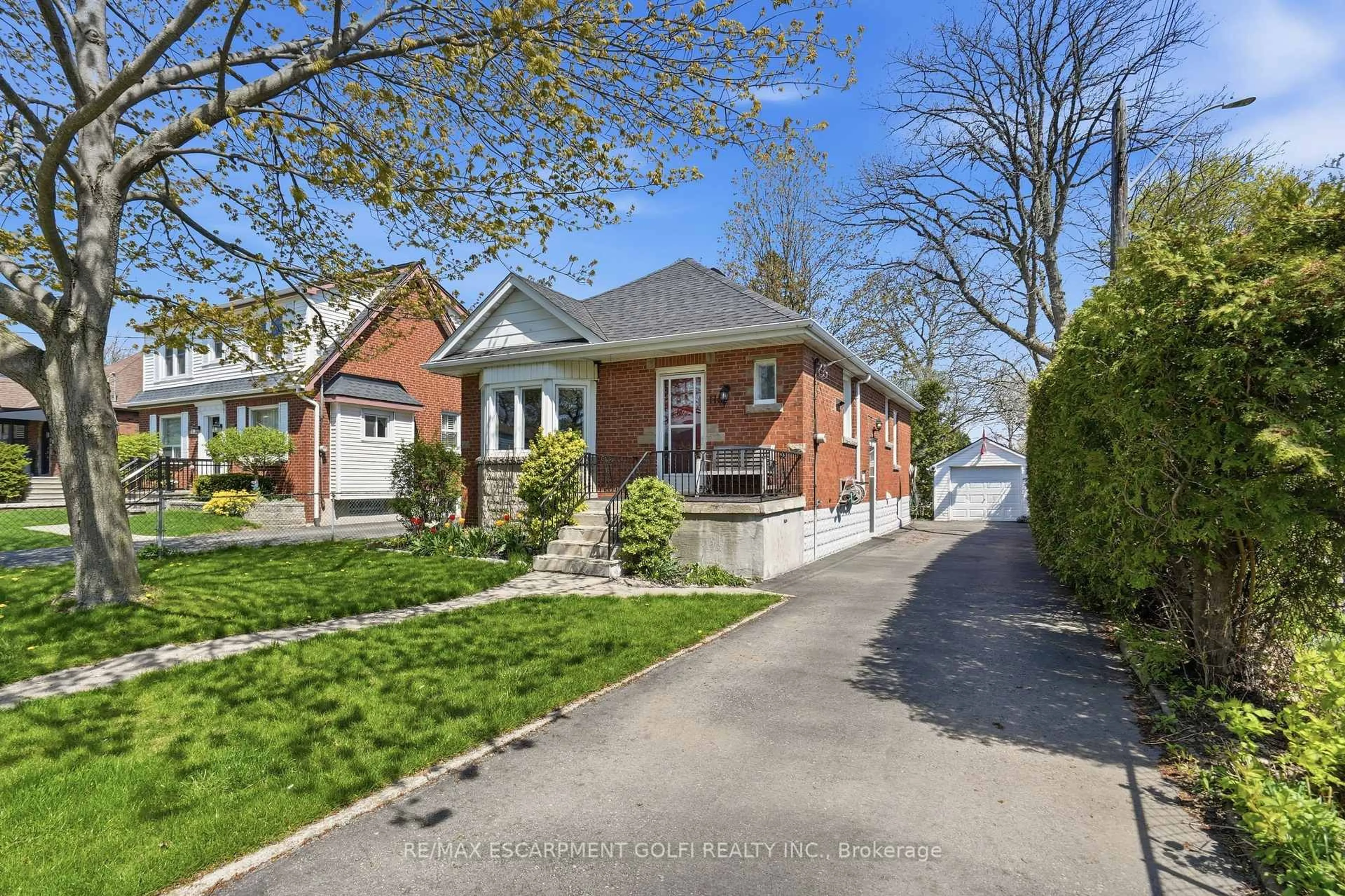 Home with brick exterior material, street for 115 Empress Ave, Hamilton Ontario L9A 1M5