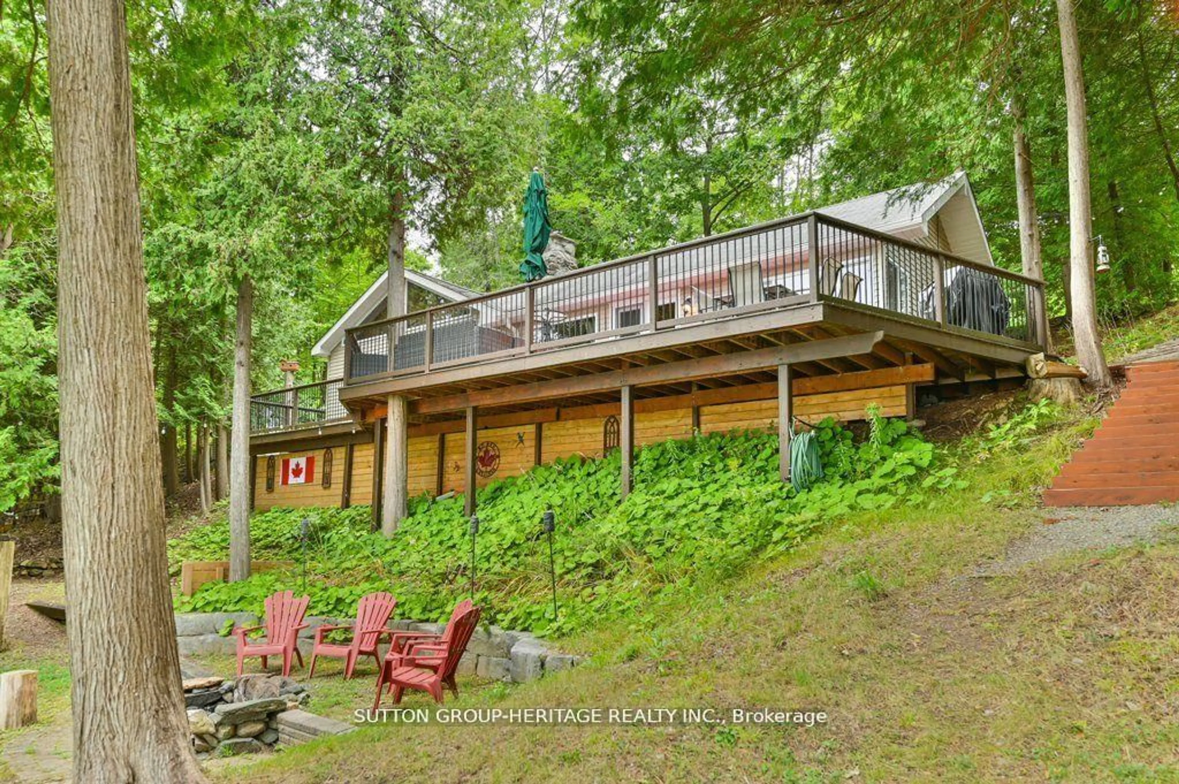 A pic from outside/outdoor area/front of a property/back of a property/a pic from drone, water/lake/river/ocean view for 224 Shoreline Lane, Madoc Ontario K0K 2K0