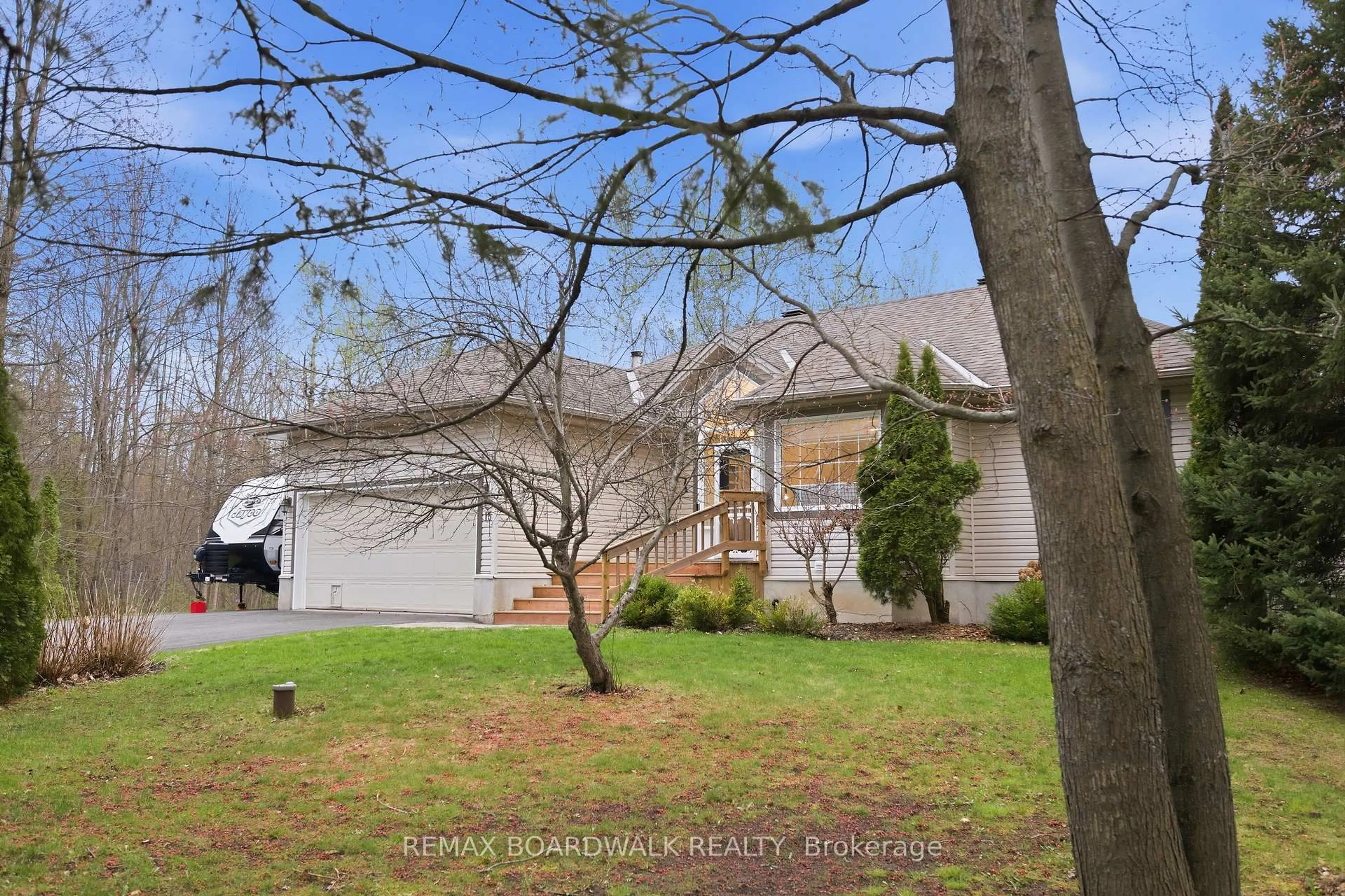 A pic from outside/outdoor area/front of a property/back of a property/a pic from drone, water/lake/river/ocean view for 15 Birch Dr, North Grenville Ontario K0G 1J0