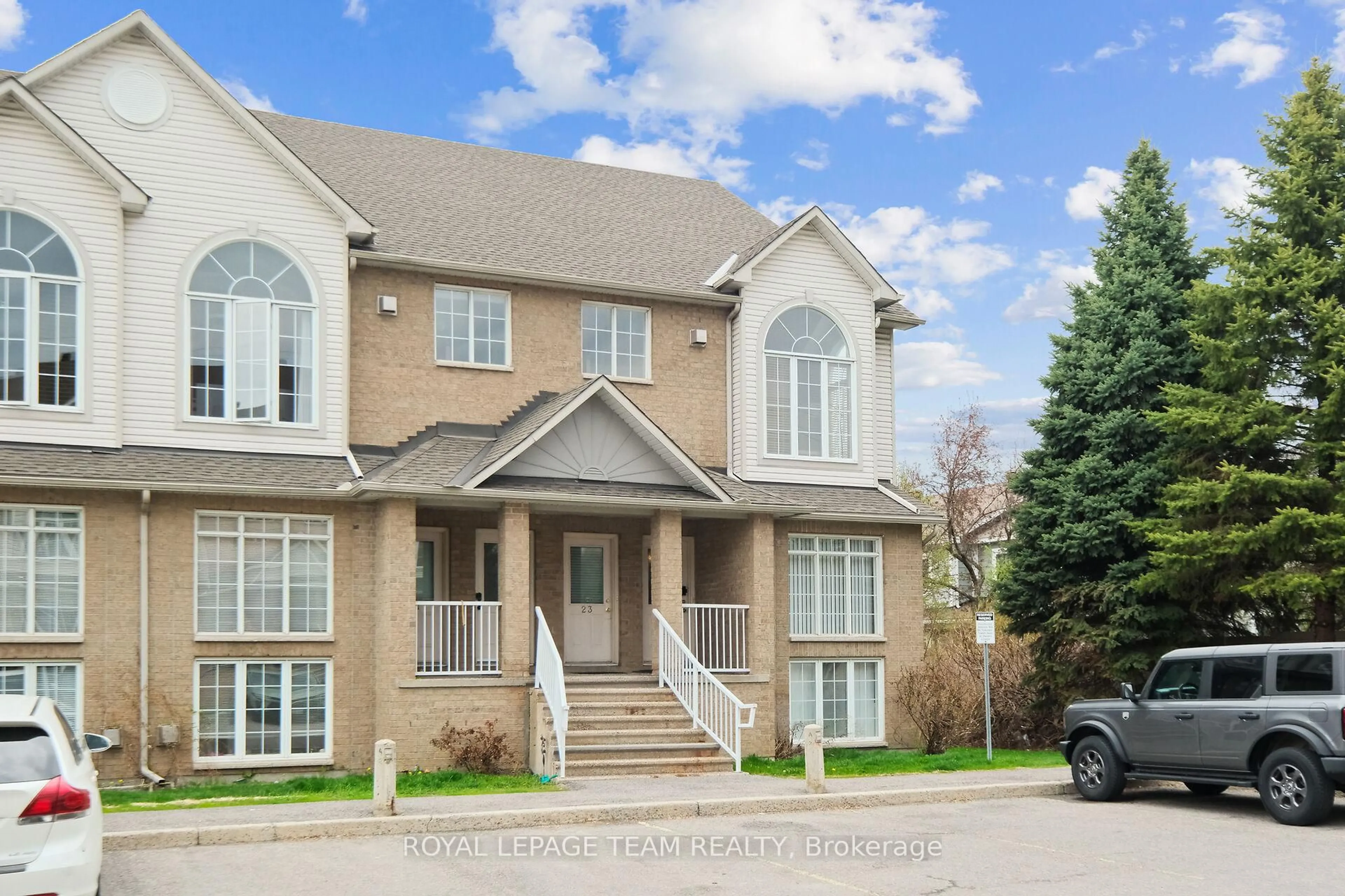 Home with brick exterior material, street for 1701 Blohm Dr #23, Ottawa Ontario K1G 6N6