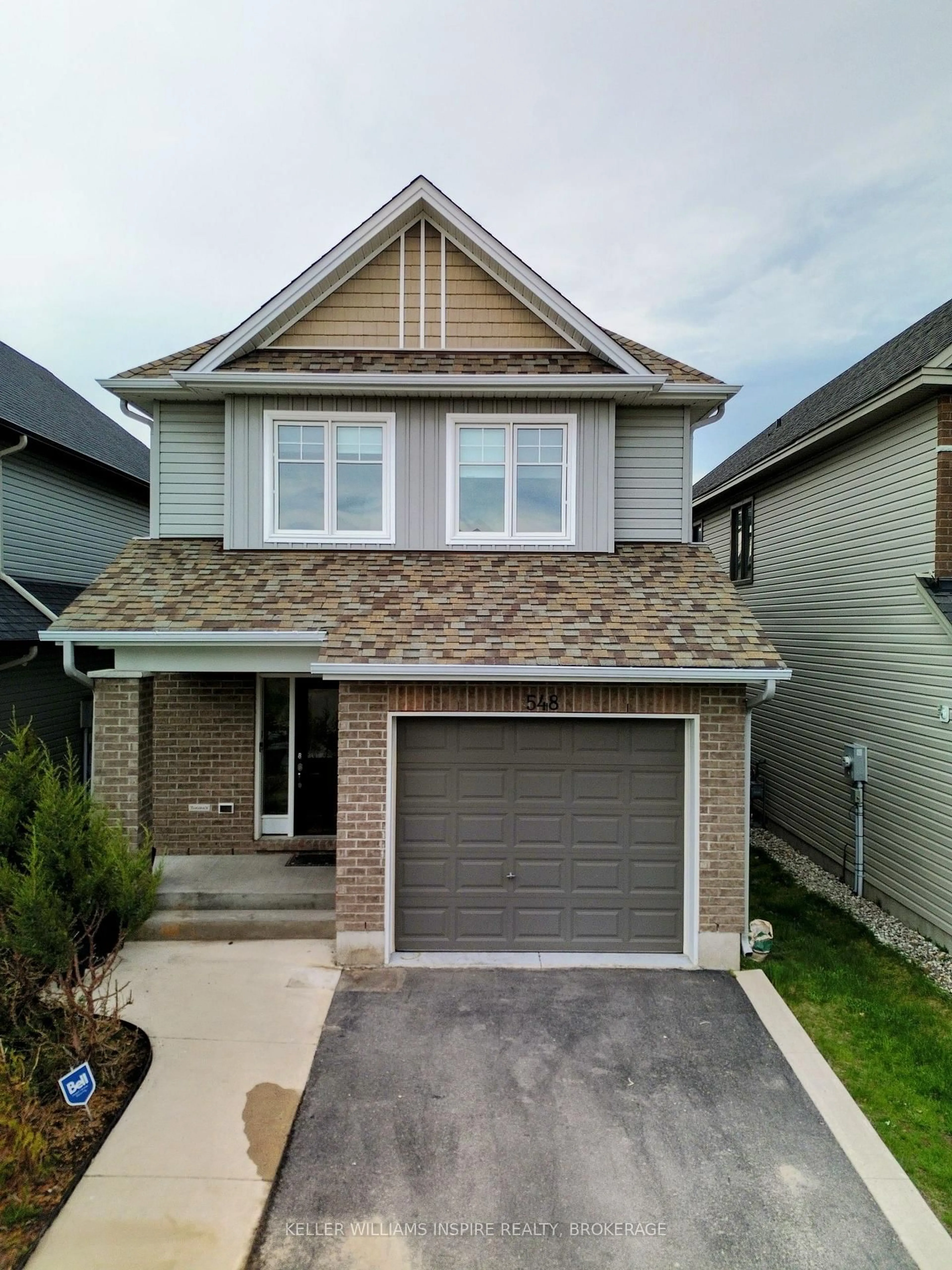 Home with brick exterior material, street for 548 Savannah Crt, Kingston Ontario K7P 0L3
