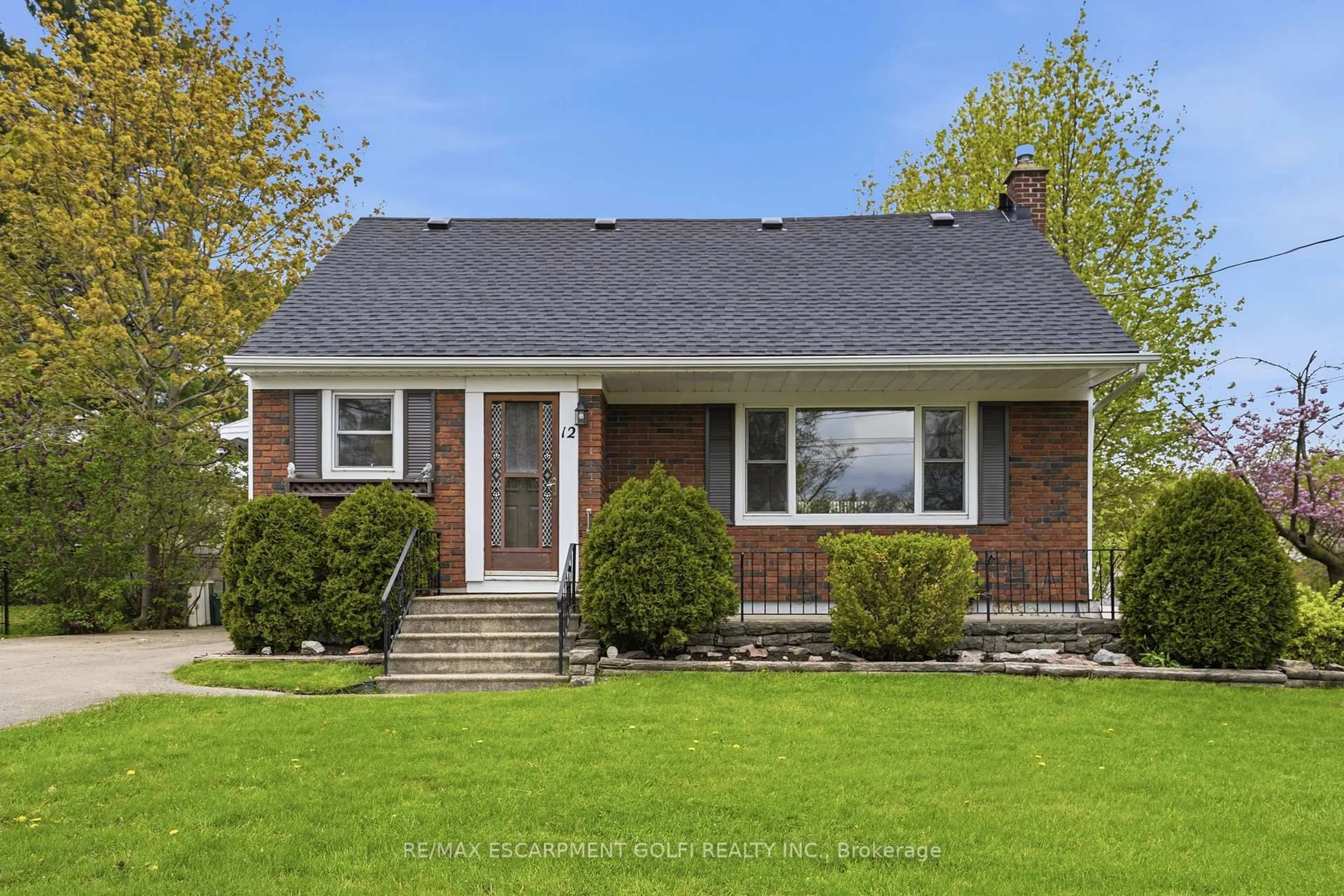 Home with brick exterior material, street for 12 Valley Rd, St. Catharines Ontario L2S 1Y6