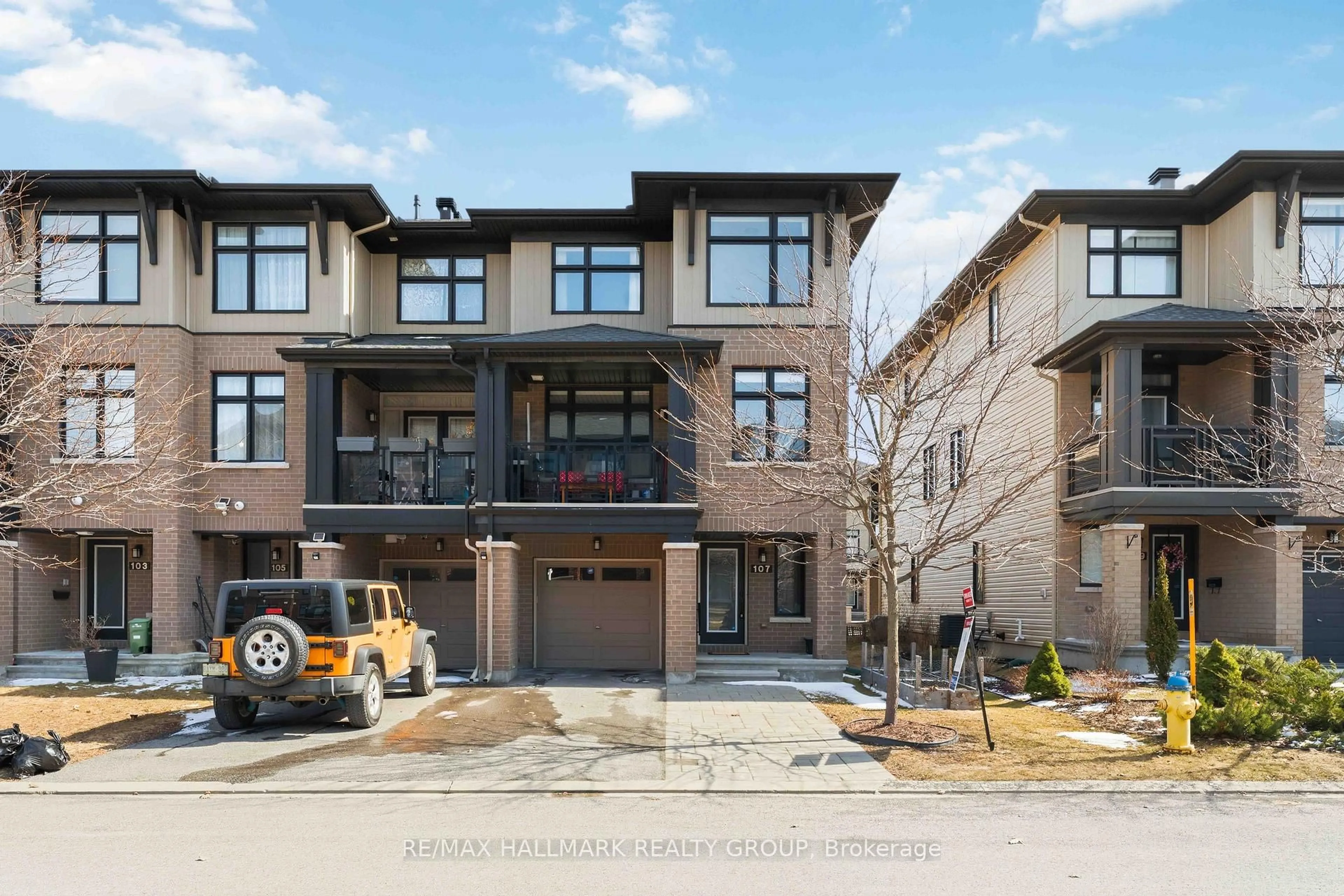 Home with brick exterior material, street for 107 WILD SENNA Way, Ottawa Ontario K2J 5Z7