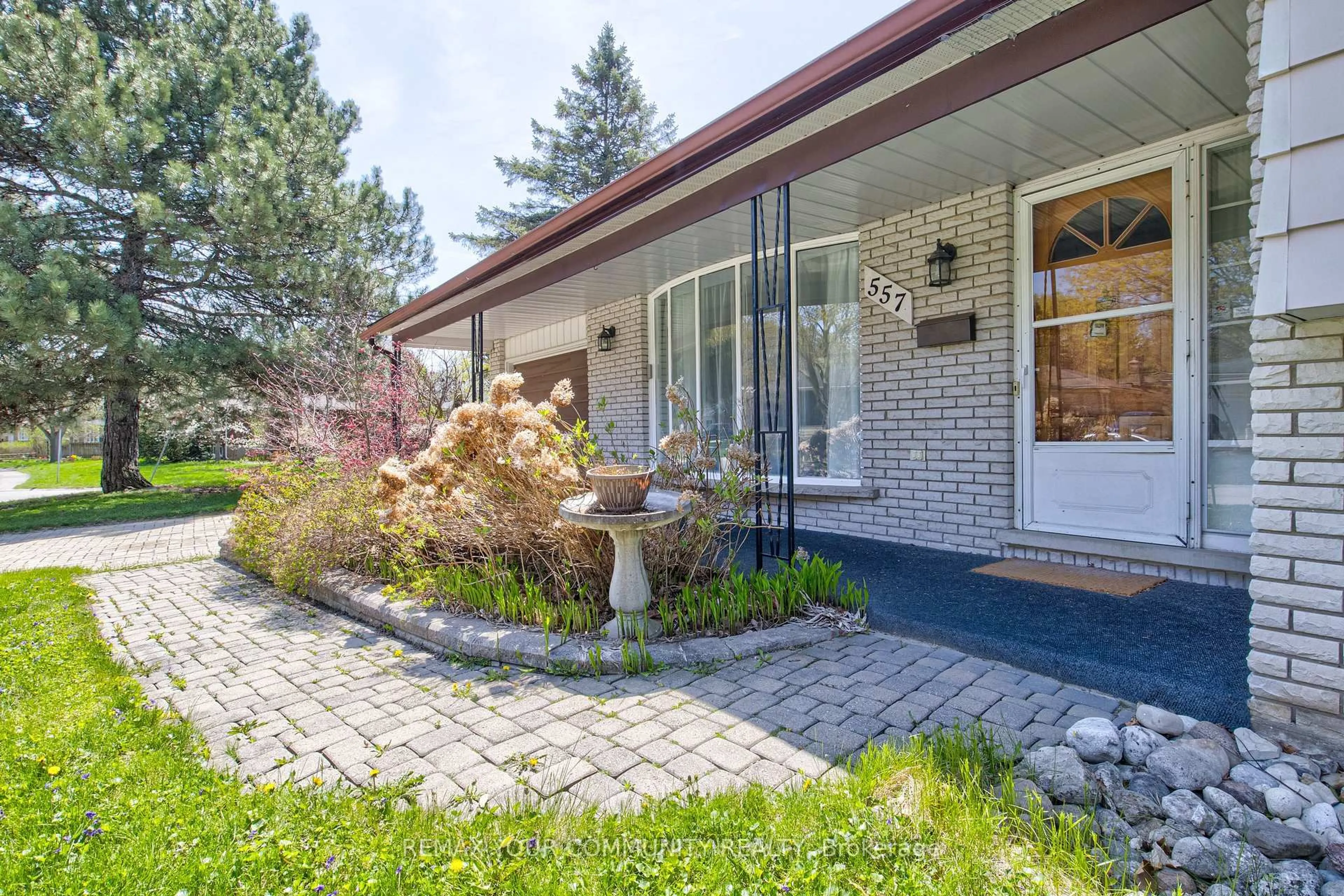 Home with brick exterior material, street for 557 Glen Manor Blvd, Waterloo Ontario N2L 4T7