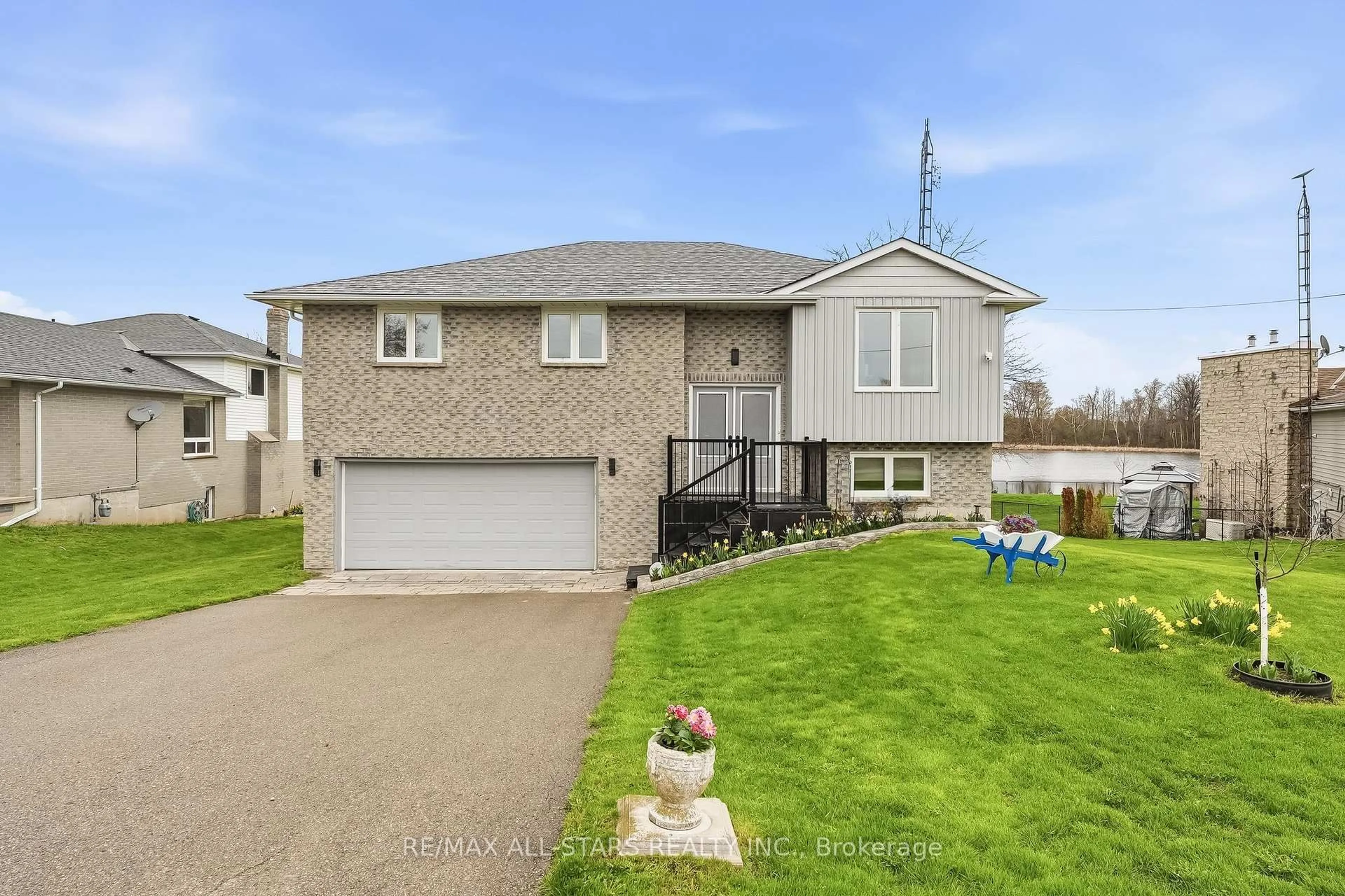A pic from outside/outdoor area/front of a property/back of a property/a pic from drone, street for 20915 Brunon Ave, Kawartha Lakes Ontario L0C 1G0