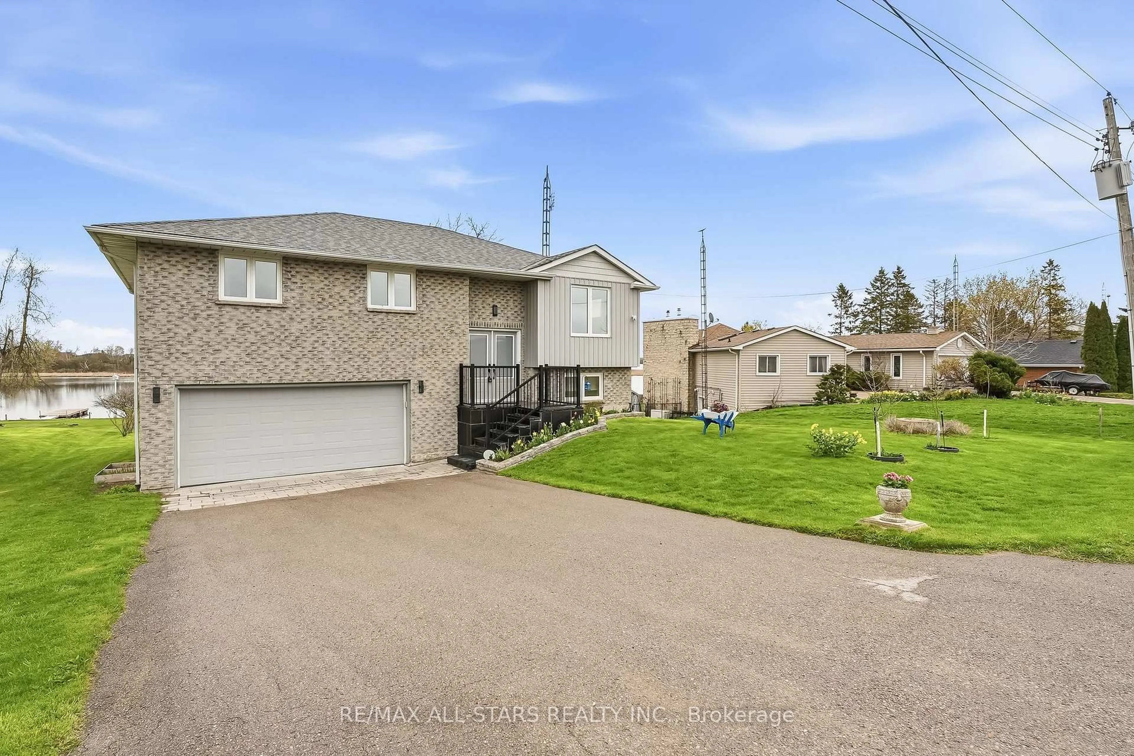 A pic from outside/outdoor area/front of a property/back of a property/a pic from drone, street for 20915 Brunon Ave, Kawartha Lakes Ontario L0C 1G0