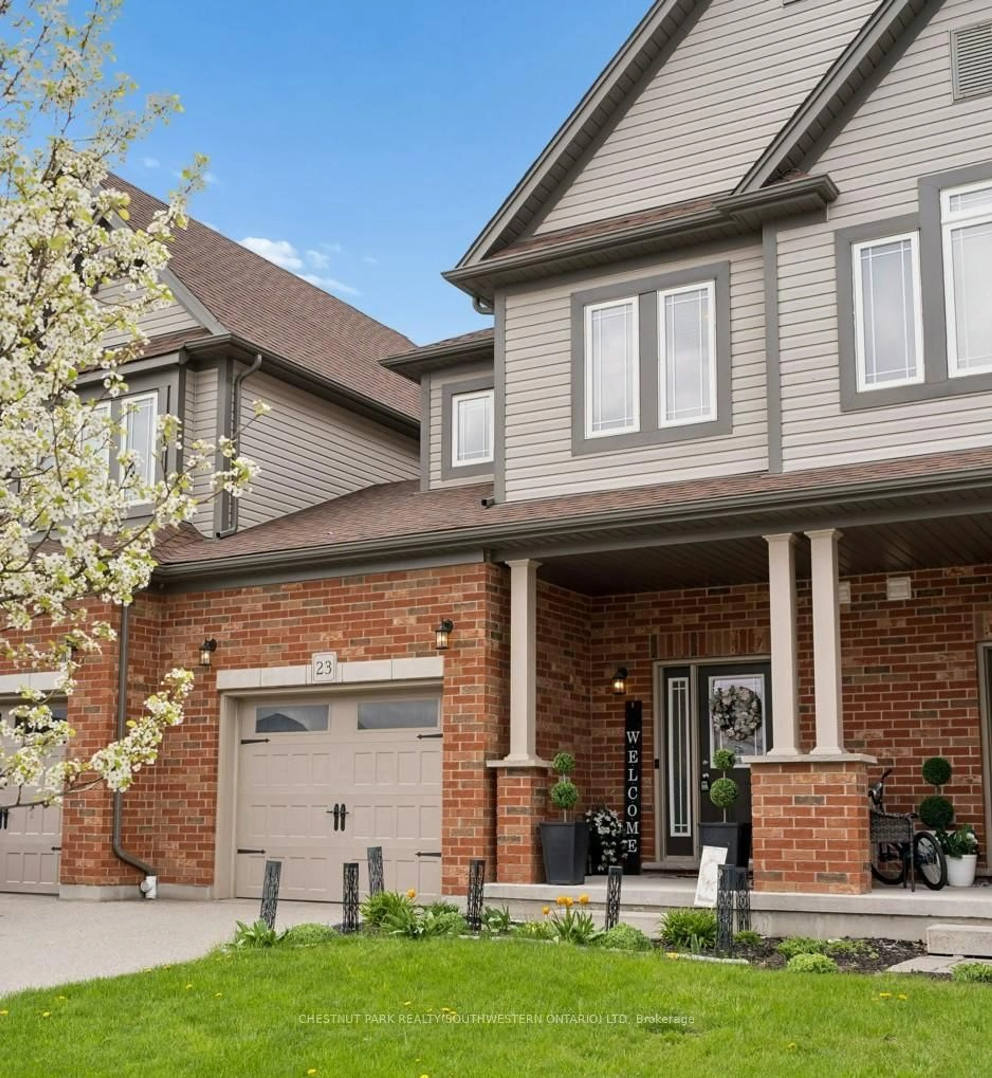Home with brick exterior material, street for 23 Valleybrook Dr, Kitchener Ontario N2A 0J9