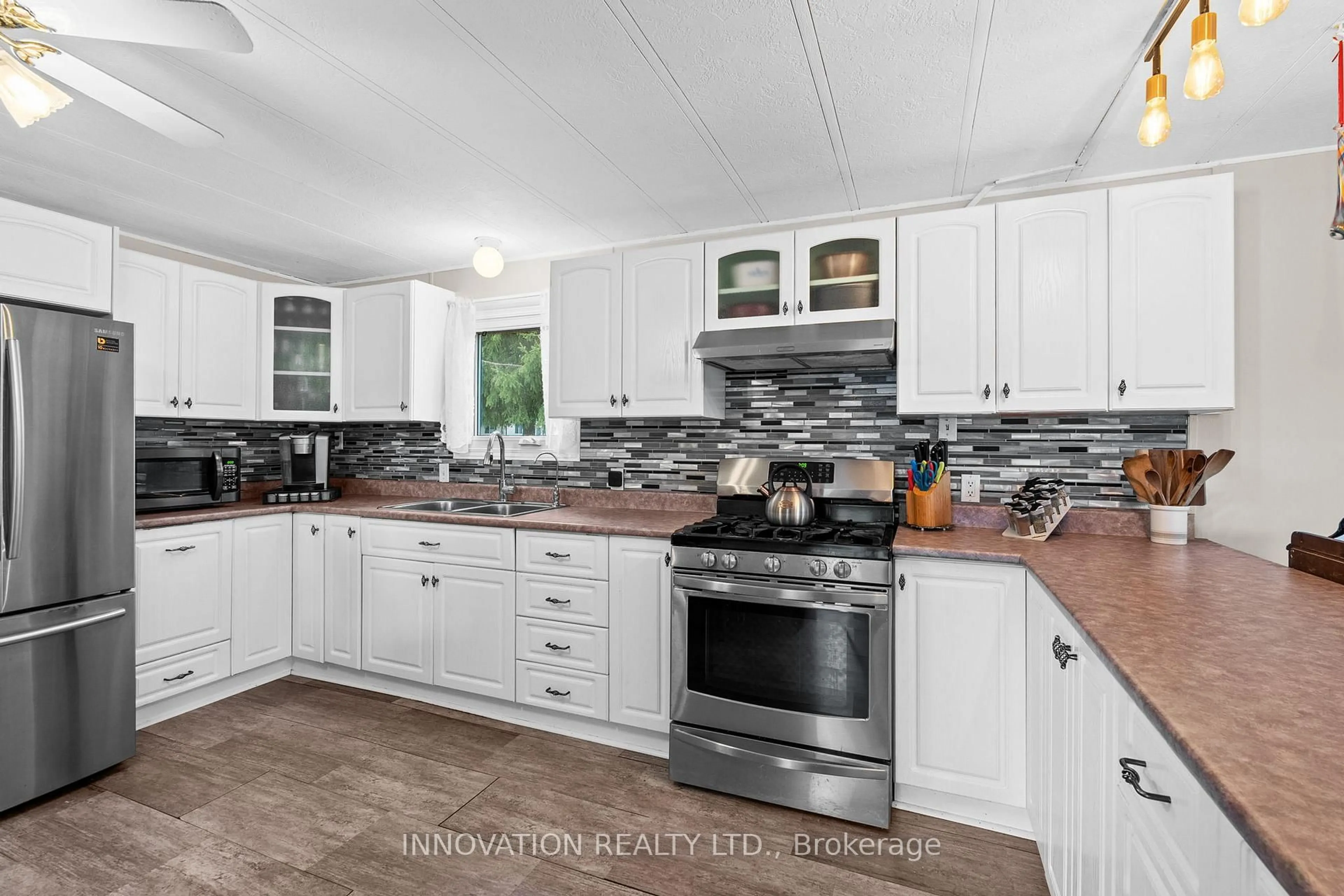 Open concept kitchen, ceramic/tile floor for 21 Evergreen Lane, White Lake Ontario K0A 3L0