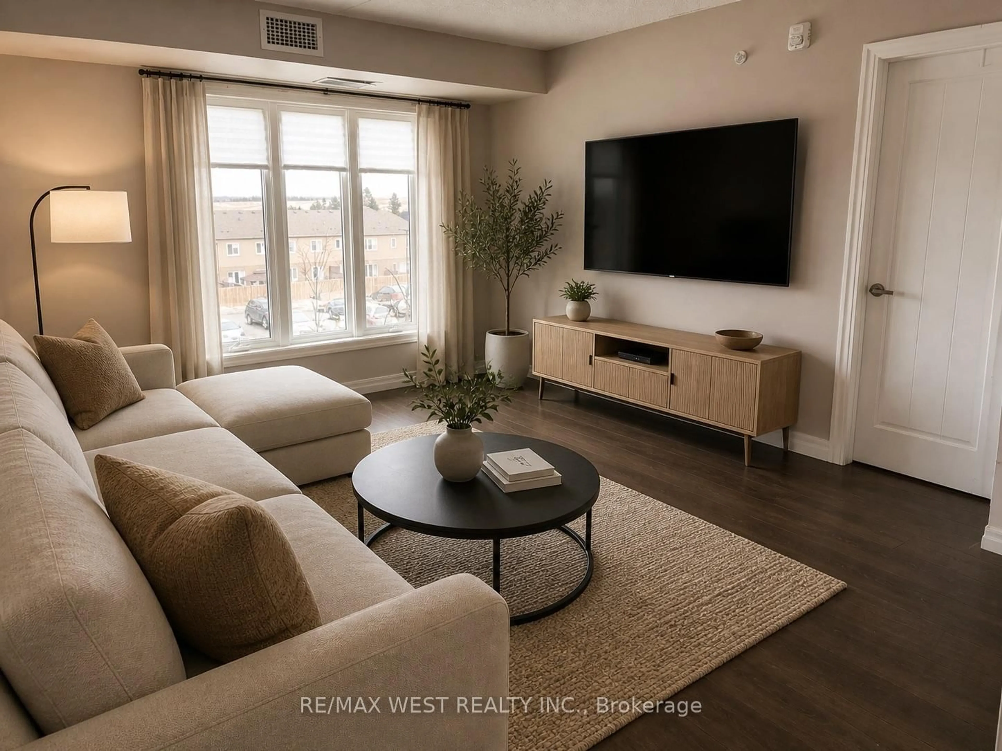 Living room with furniture, unknown for 108 SUMMIT RIDGE Dr #207, Guelph Ontario N1E 0P8