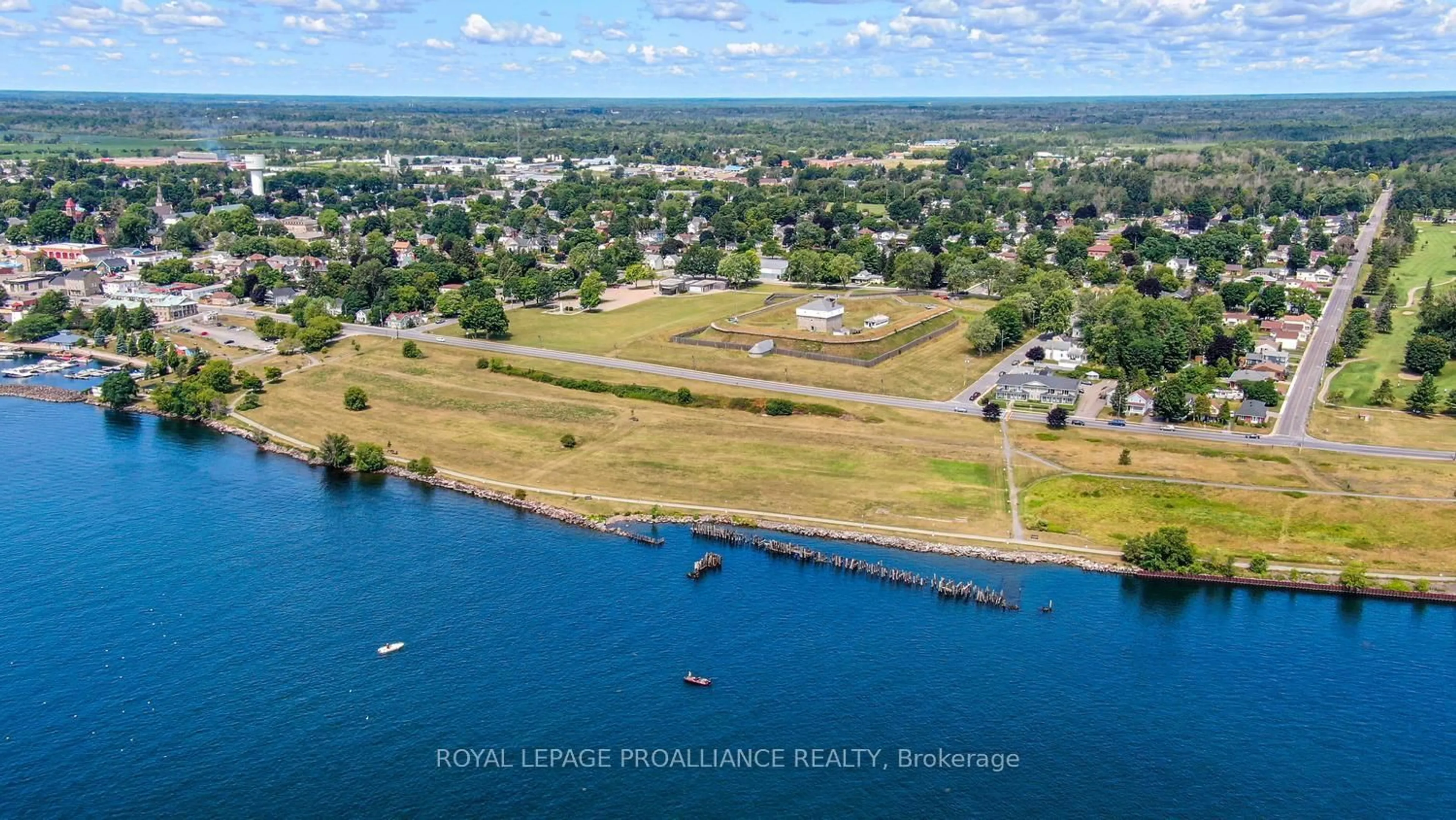 A pic from outside/outdoor area/front of a property/back of a property/a pic from drone, water/lake/river/ocean view for 410 King St #6, Prescott Ontario K0E 1T0