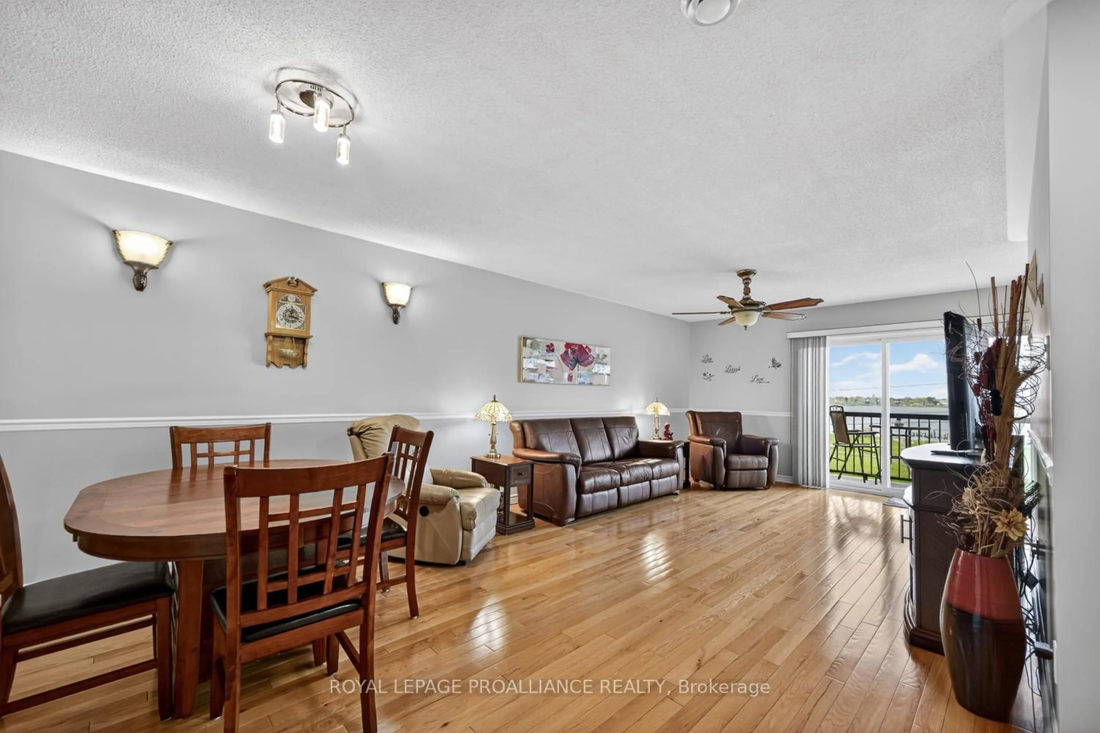 Living room with furniture, wood/laminate floor for 410 King St #6, Prescott Ontario K0E 1T0