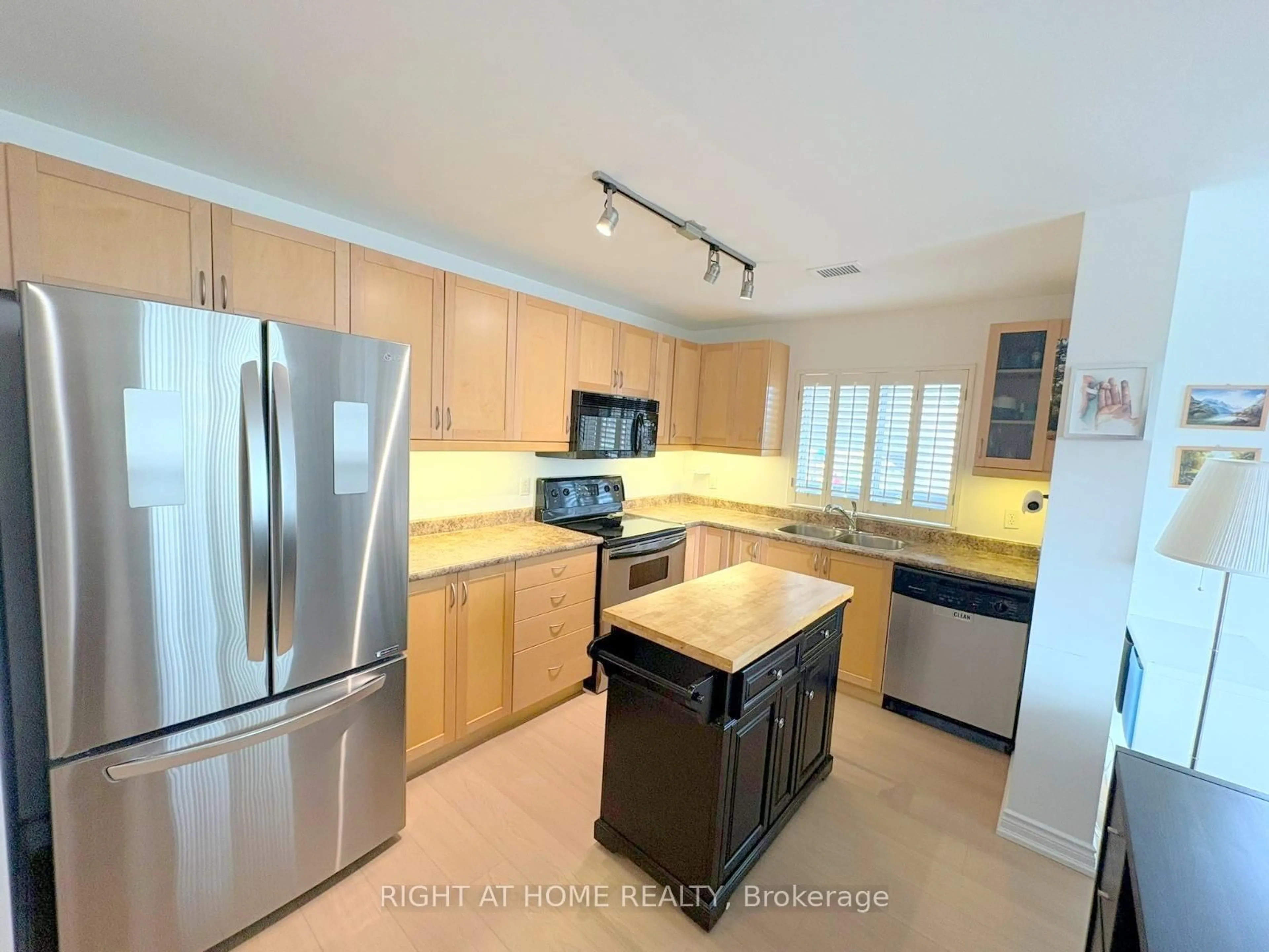 Open concept kitchen, ceramic/tile floor for 2000 Creekside Dr #202, Hamilton Ontario L9H 7S7