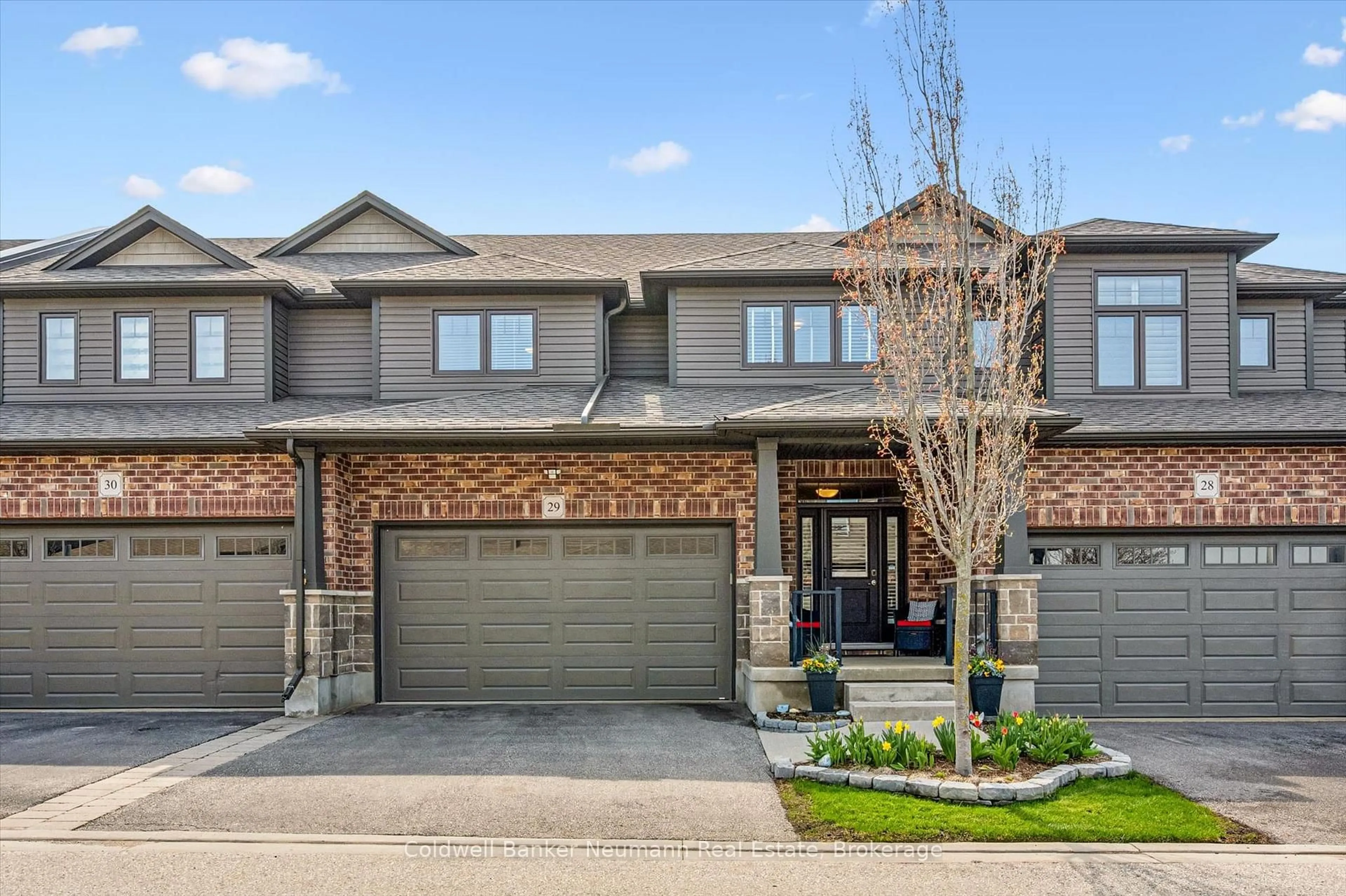 Home with brick exterior material, street for 254 Gosling Gdns #29, Guelph Ontario N1L 0M4