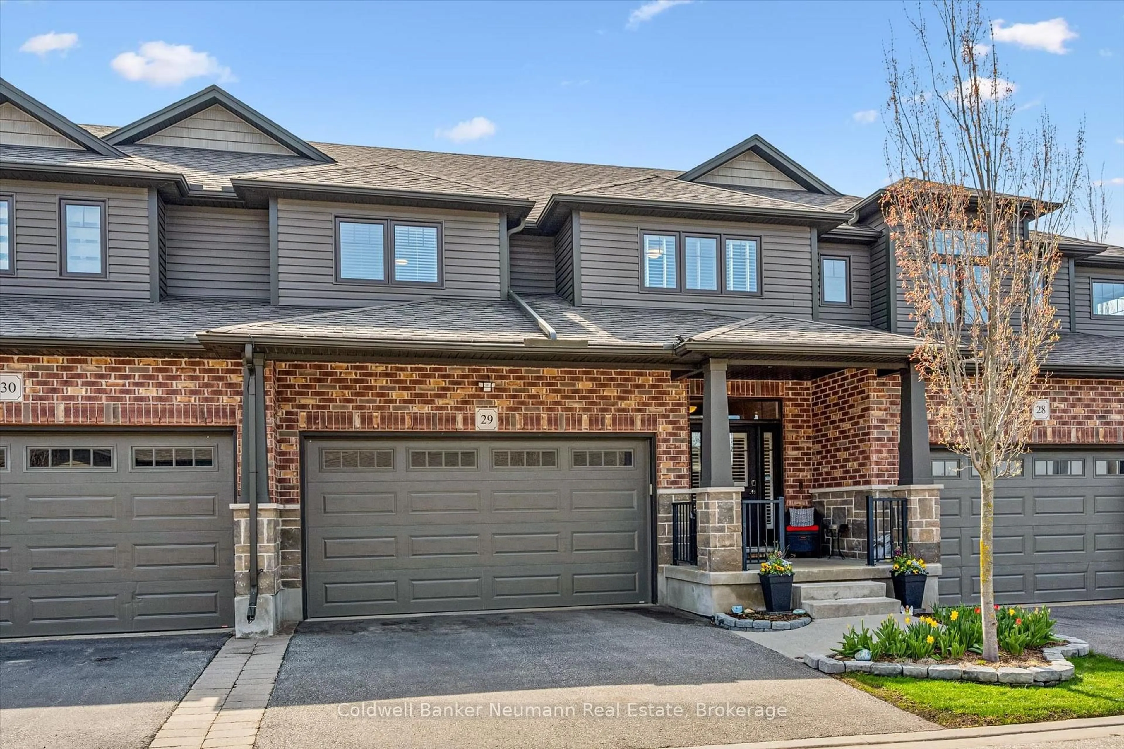 Home with brick exterior material, street for 254 Gosling Gdns #29, Guelph Ontario N1L 0M4