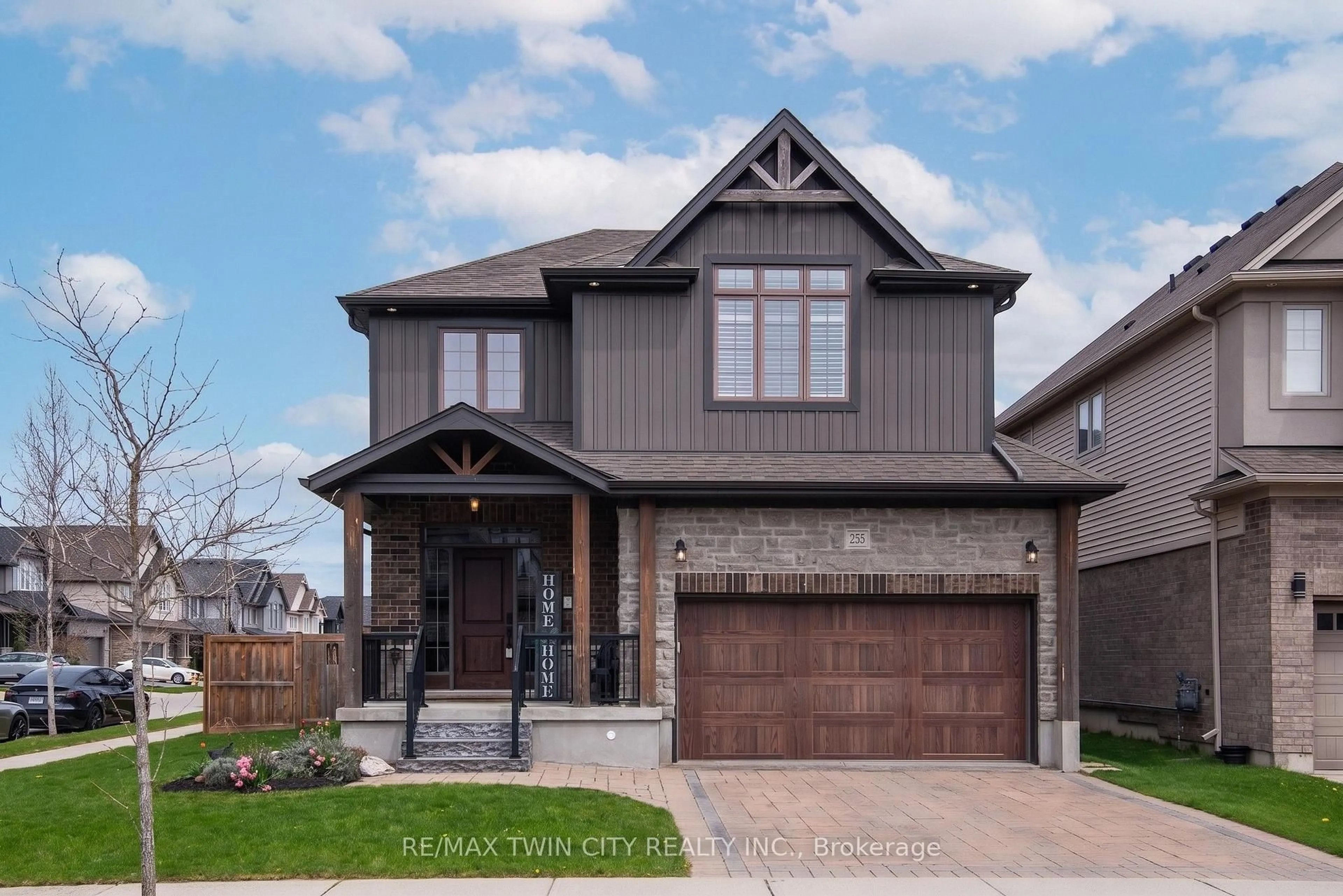 Home with brick exterior material, street for 255 Falconridge Dr, Kitchener Ontario N2K 0B6