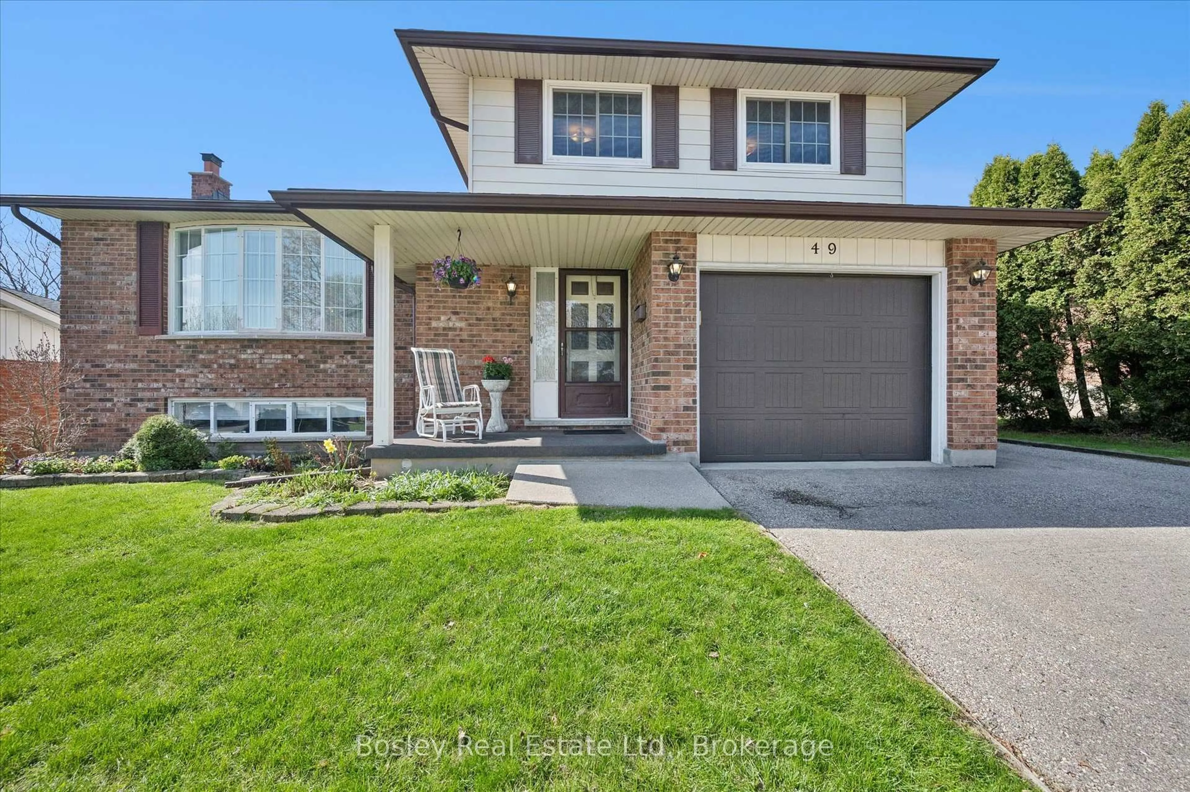 Home with brick exterior material, street for 49 Ripley Cres, Kitchener Ontario N2N 1W2