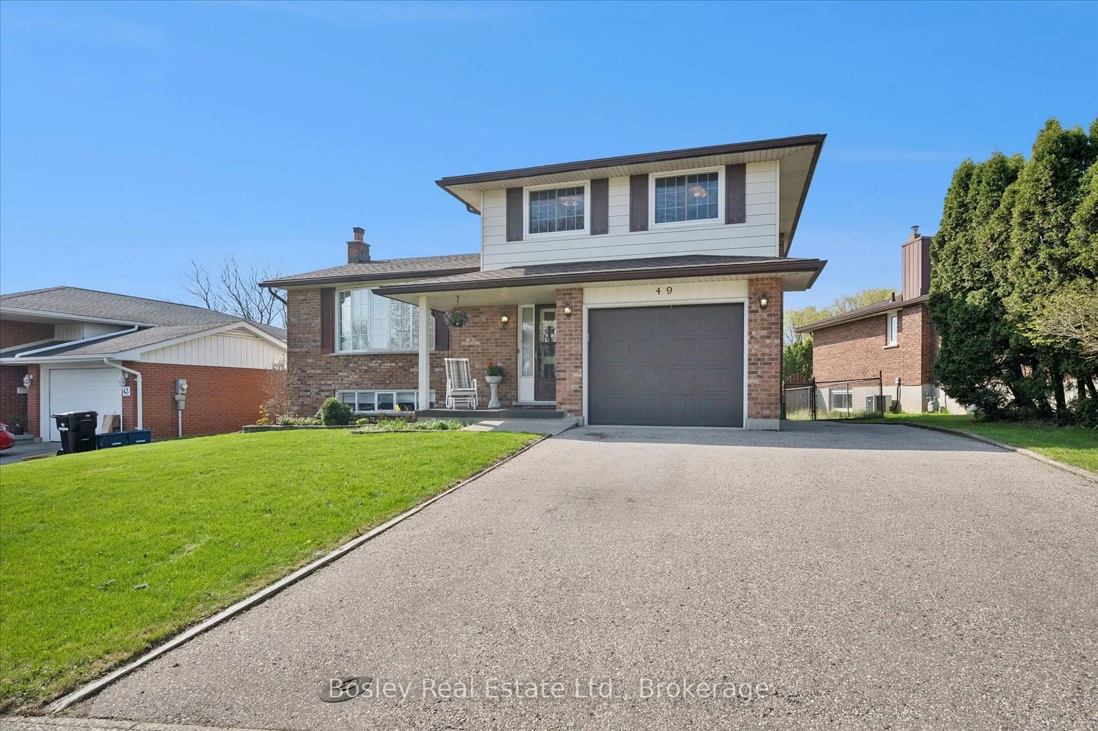 Home with brick exterior material, street for 49 Ripley Cres, Kitchener Ontario N2N 1W2