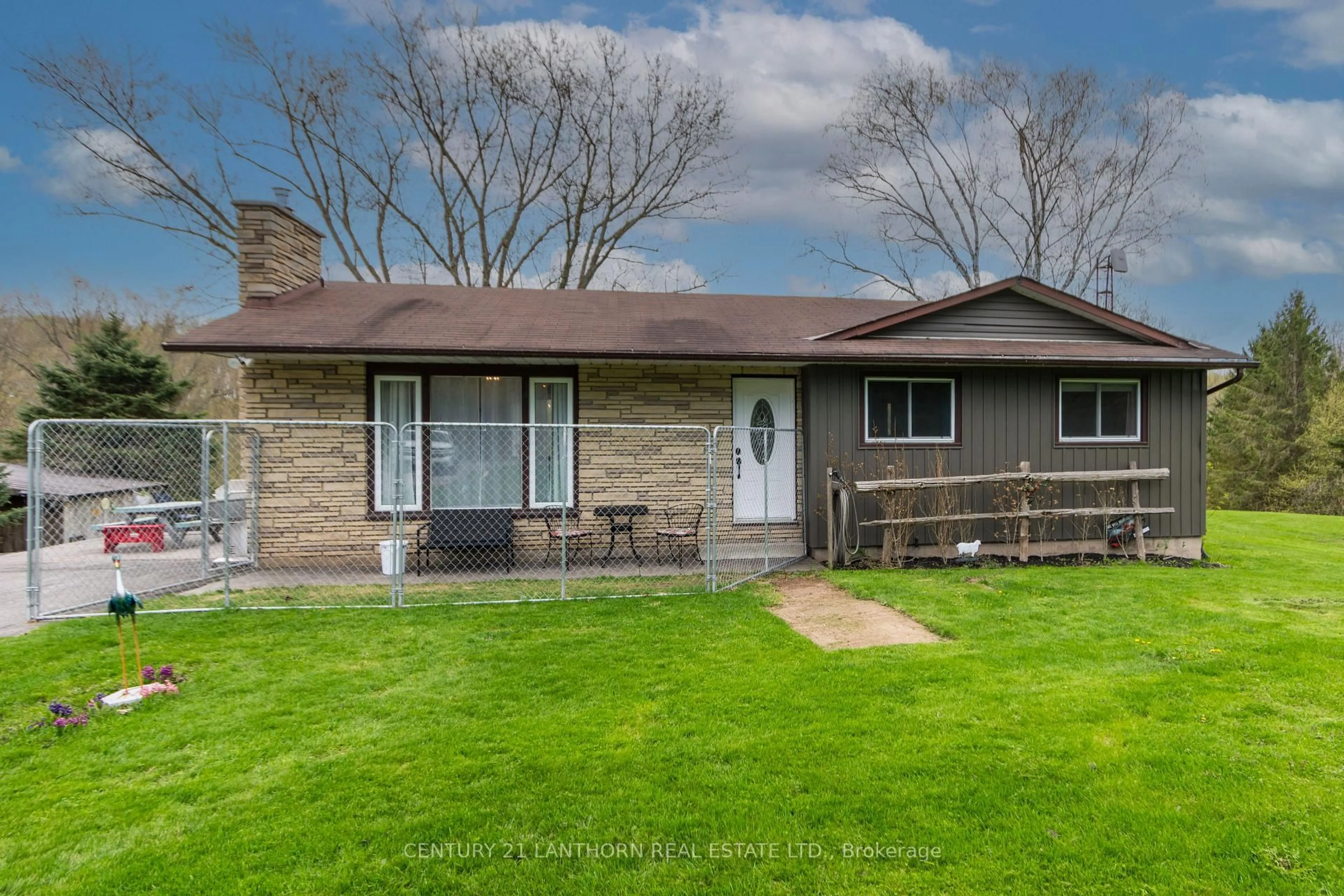Home with vinyl exterior material, street for 1123 Old Wooler Rd, Brighton Ontario K0K 1R0