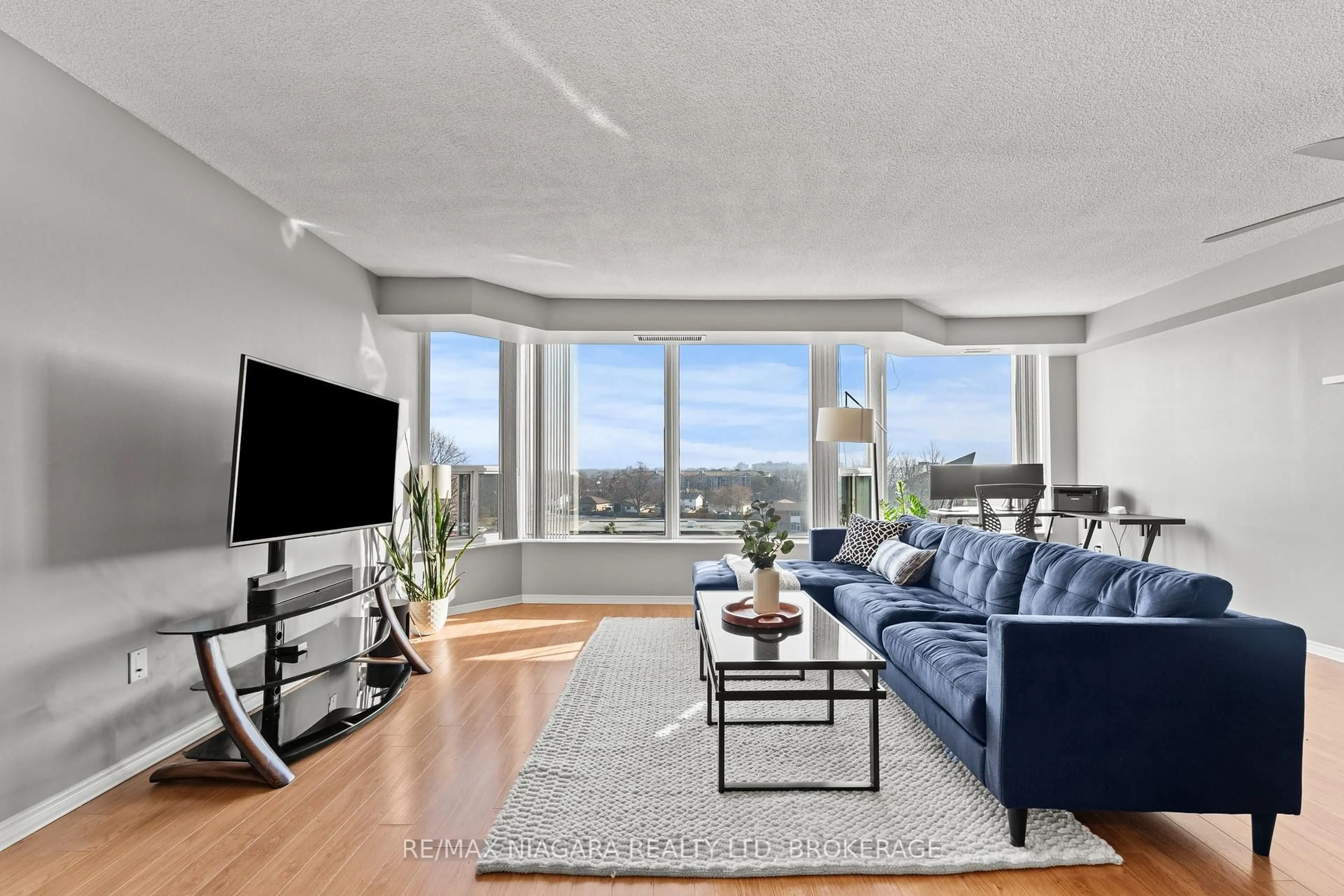 Living room with furniture, unknown for 81 Scott St #601, St. Catharines Ontario L2N 7L5