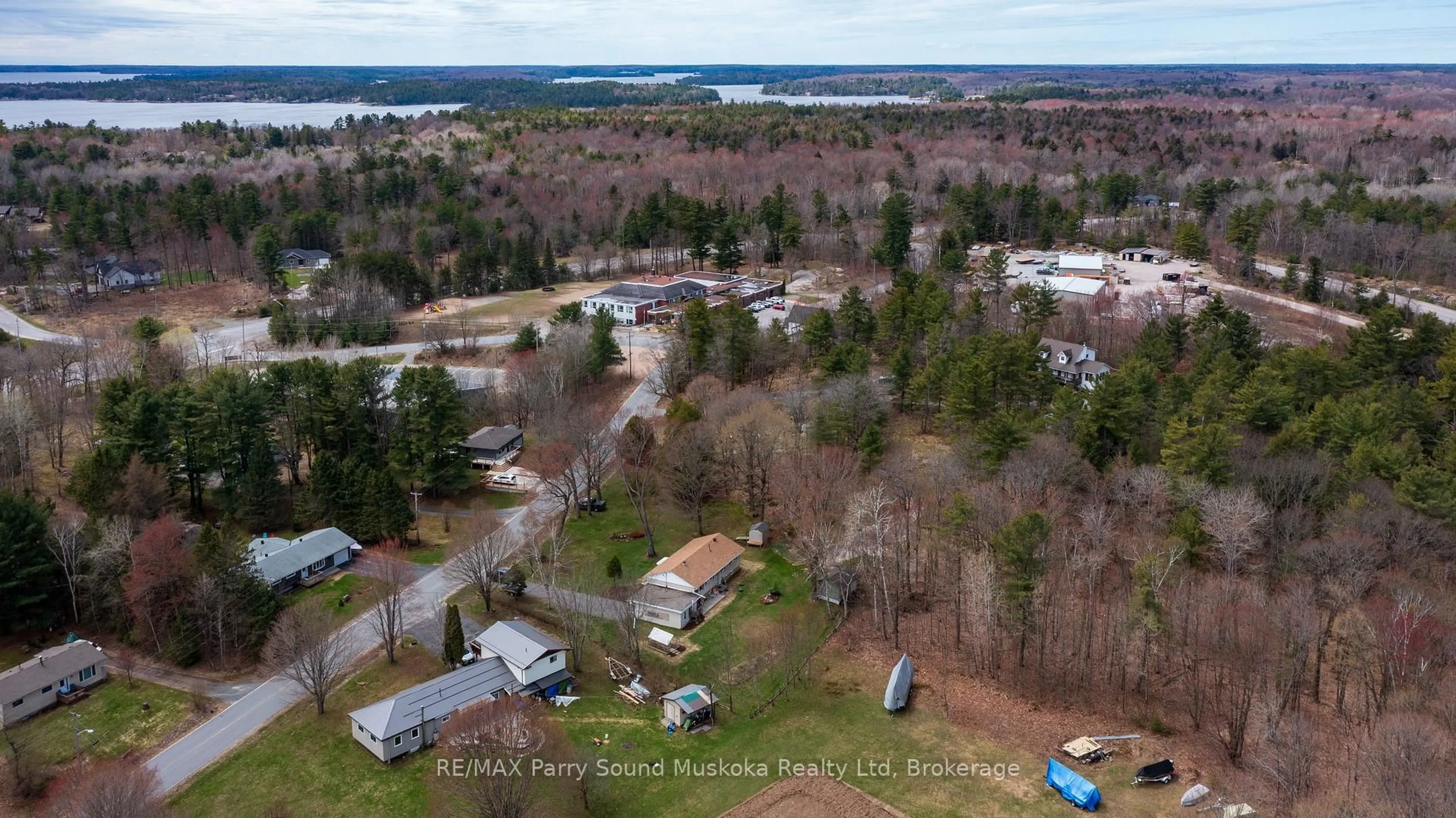 A pic from outside/outdoor area/front of a property/back of a property/a pic from drone, water/lake/river/ocean view for 137 Hammel Ave, McDougall Ontario P0G 1G0