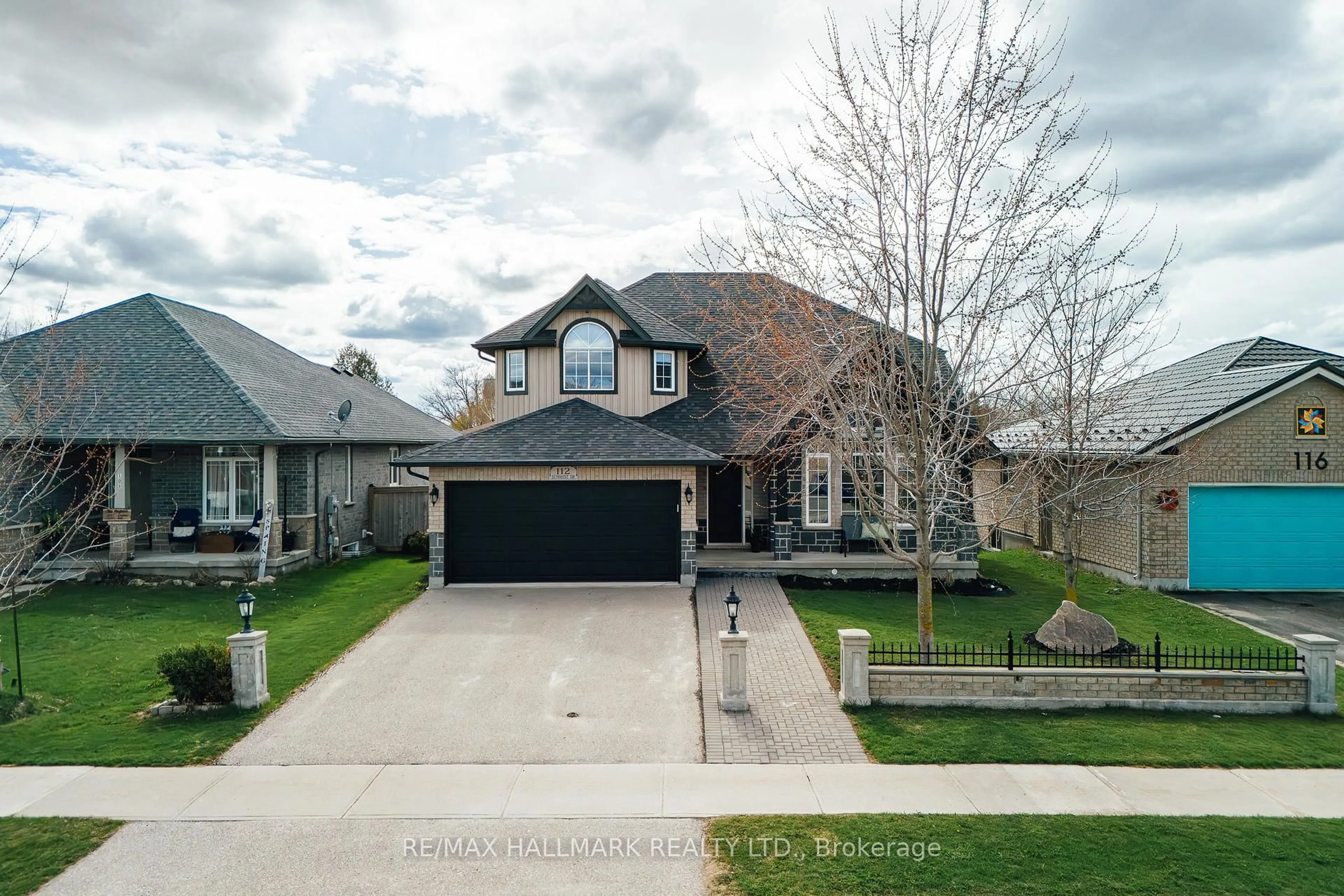 A pic from outside/outdoor area/front of a property/back of a property/a pic from drone, street for 112 Schmidt Dr, Wellington North Ontario N0G 1A0