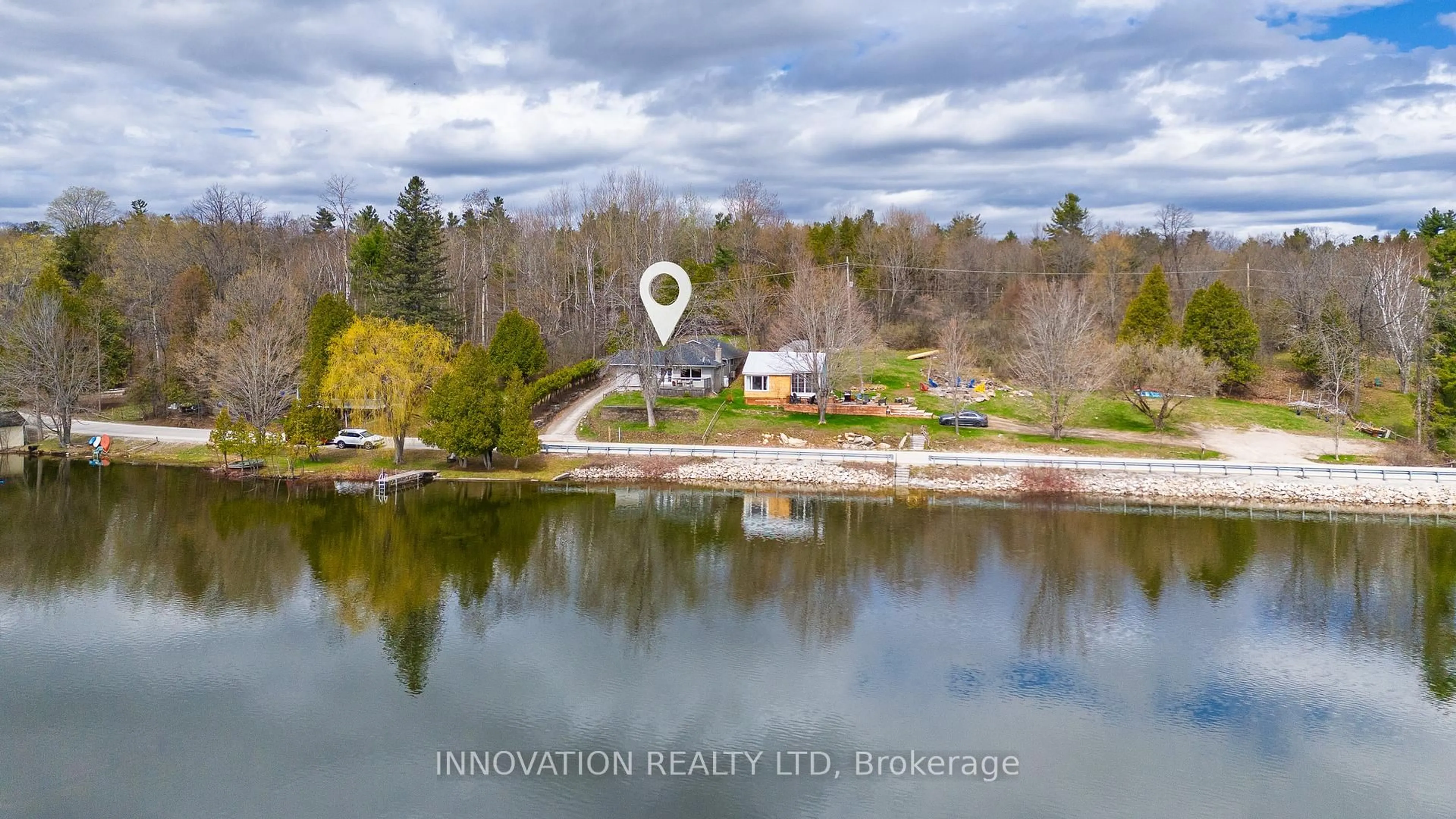 A pic from outside/outdoor area/front of a property/back of a property/a pic from drone, water/lake/river/ocean view for 568 Christie Lake North Shore Rd, Perth Ontario K7H 3C6