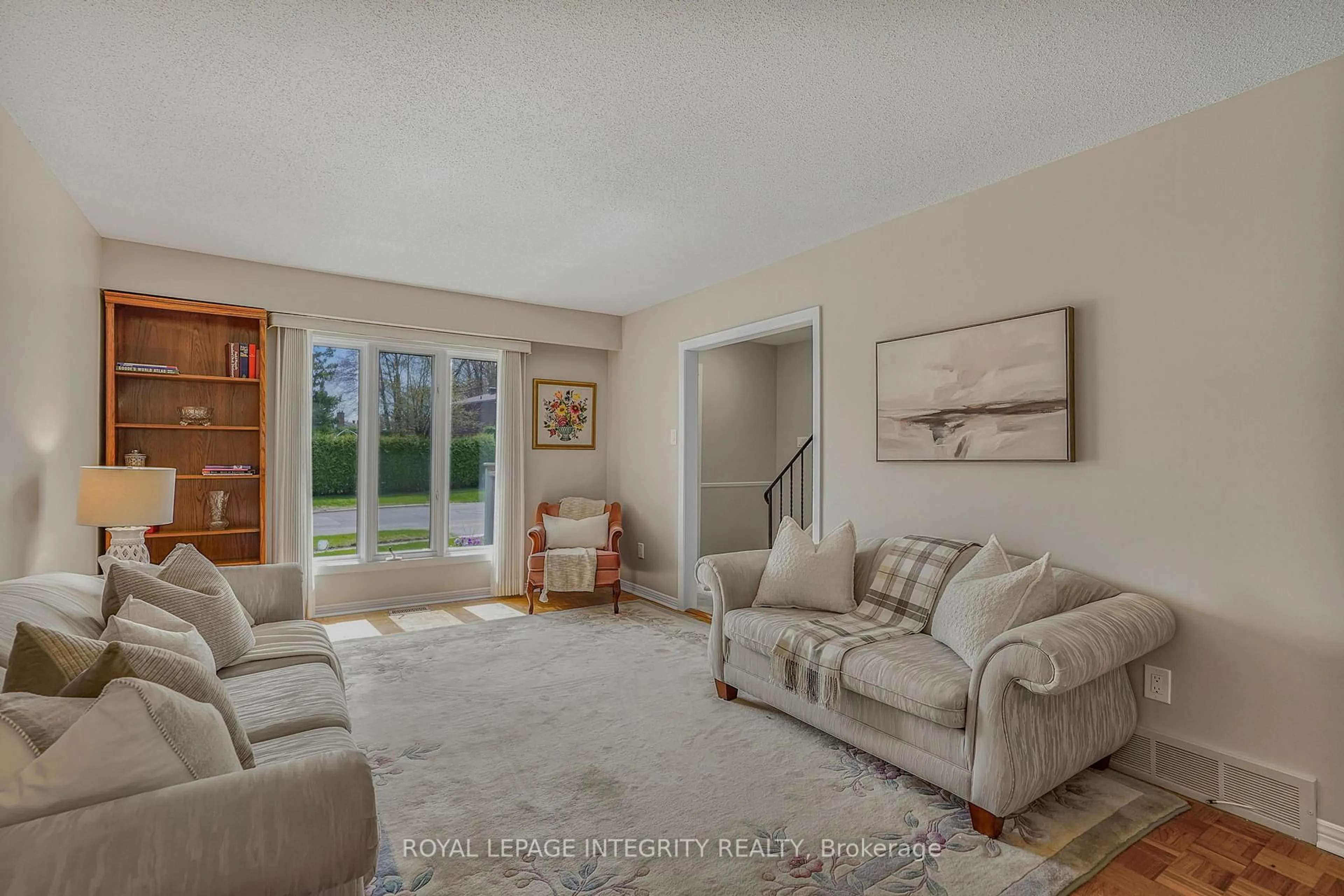 Living room with furniture, unknown for 74 Valewood Cres, Ottawa Ontario K1B 4E8