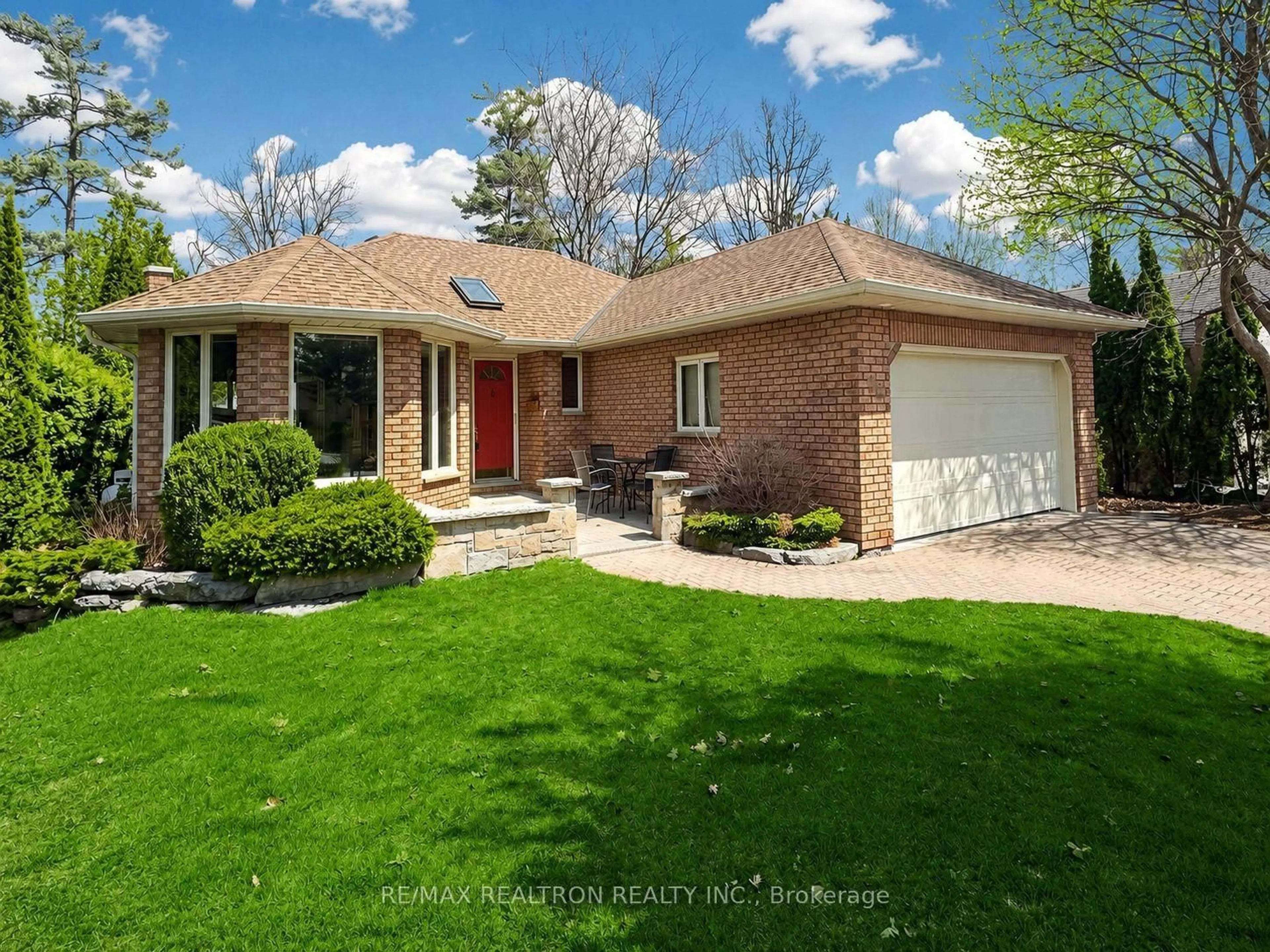 Home with brick exterior material, street for 98 Navigators Trail, Kawartha Lakes Ontario K0M 1A0