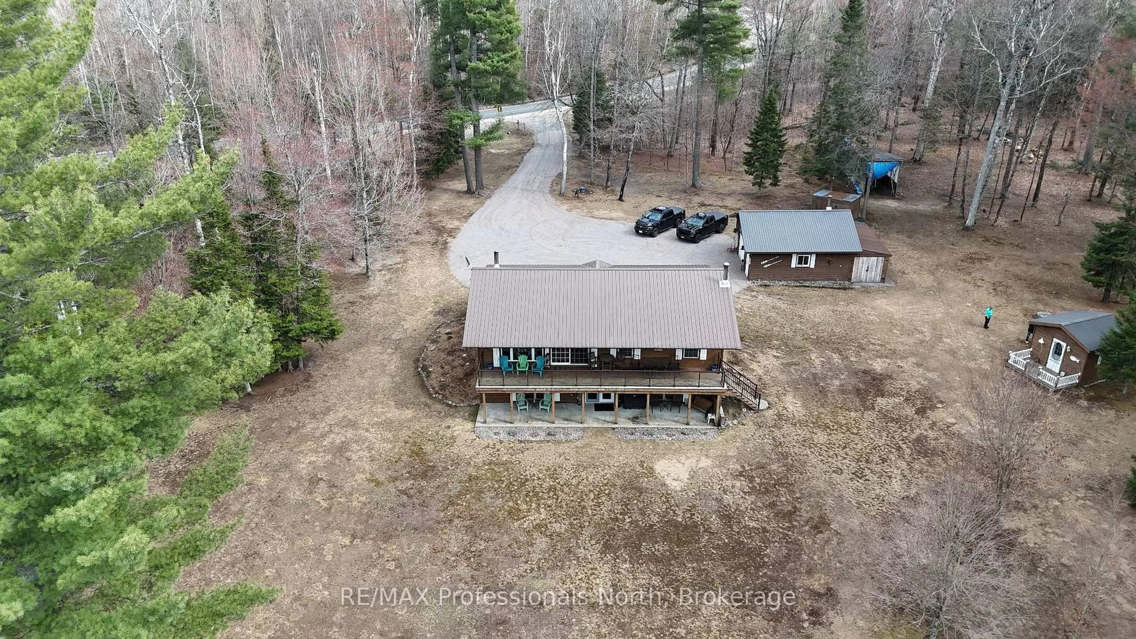 A pic from outside/outdoor area/front of a property/back of a property/a pic from drone, unknown for 3951 Elephant Lake Rd, Dysart et al Ontario K0L 1X0