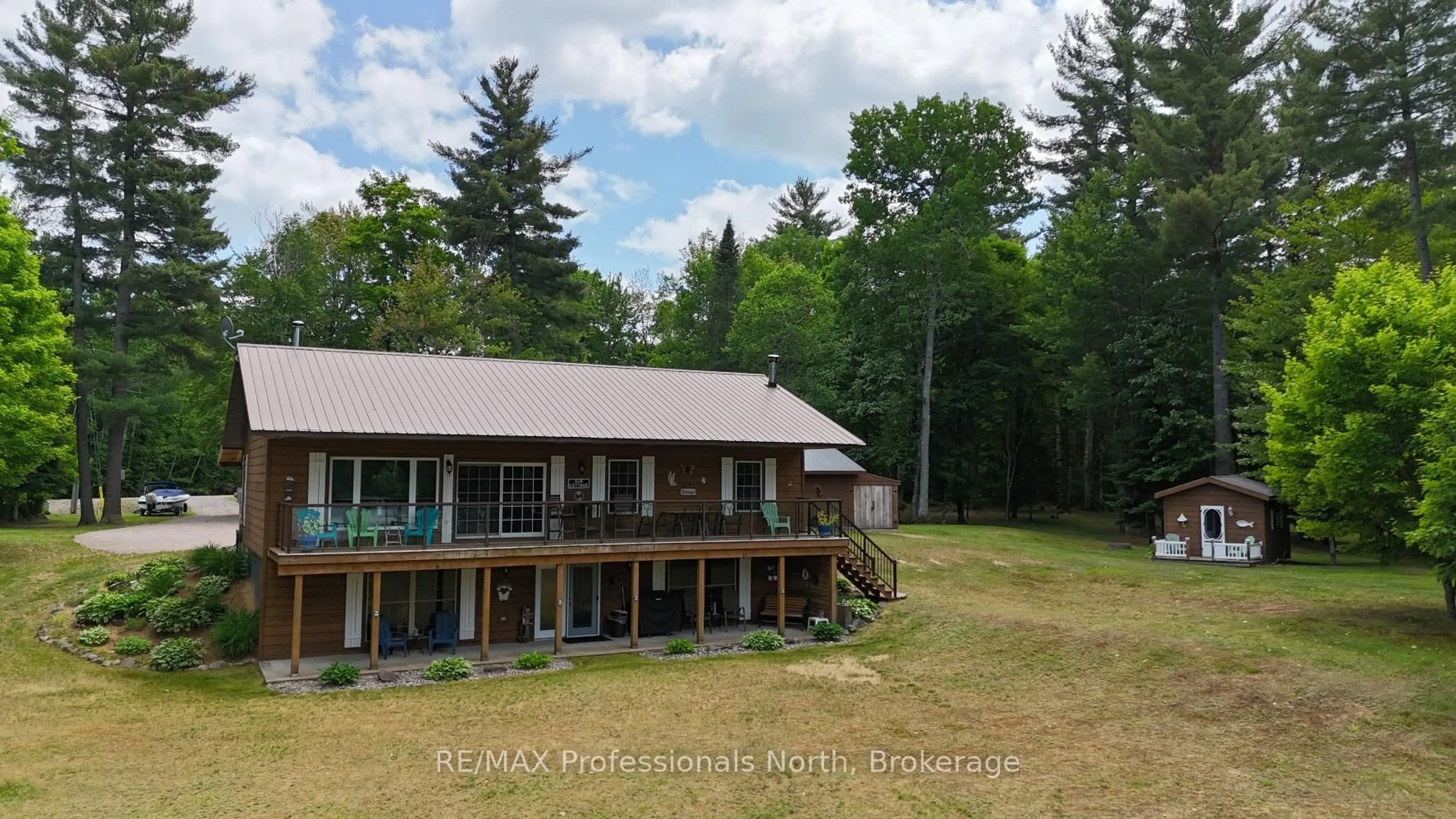 A pic from outside/outdoor area/front of a property/back of a property/a pic from drone, unknown for 3951 Elephant Lake Rd, Dysart et al Ontario K0L 1X0