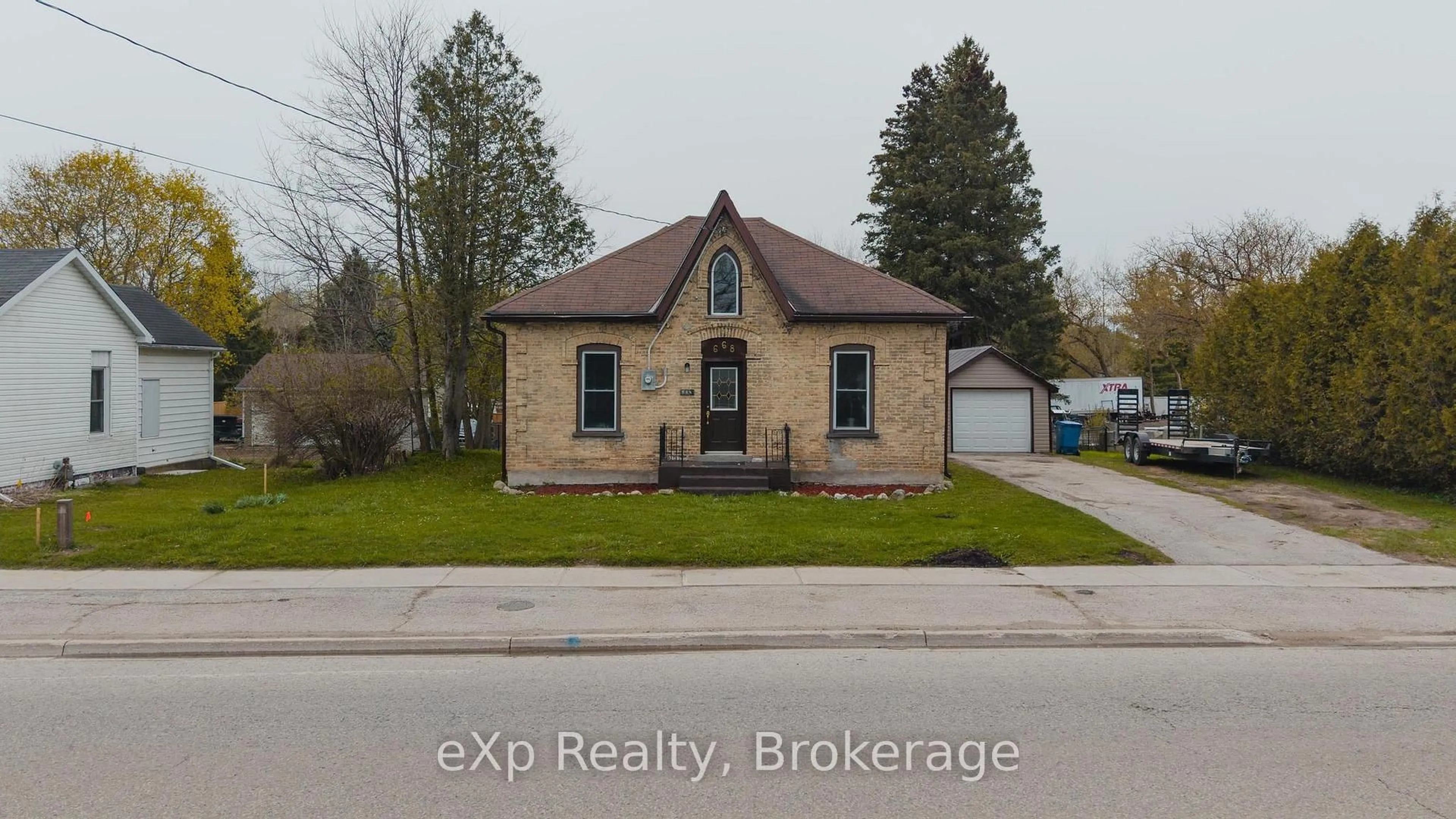Home with brick exterior material, street for 668 Garafraxa St, West Grey Ontario N0G 1R0