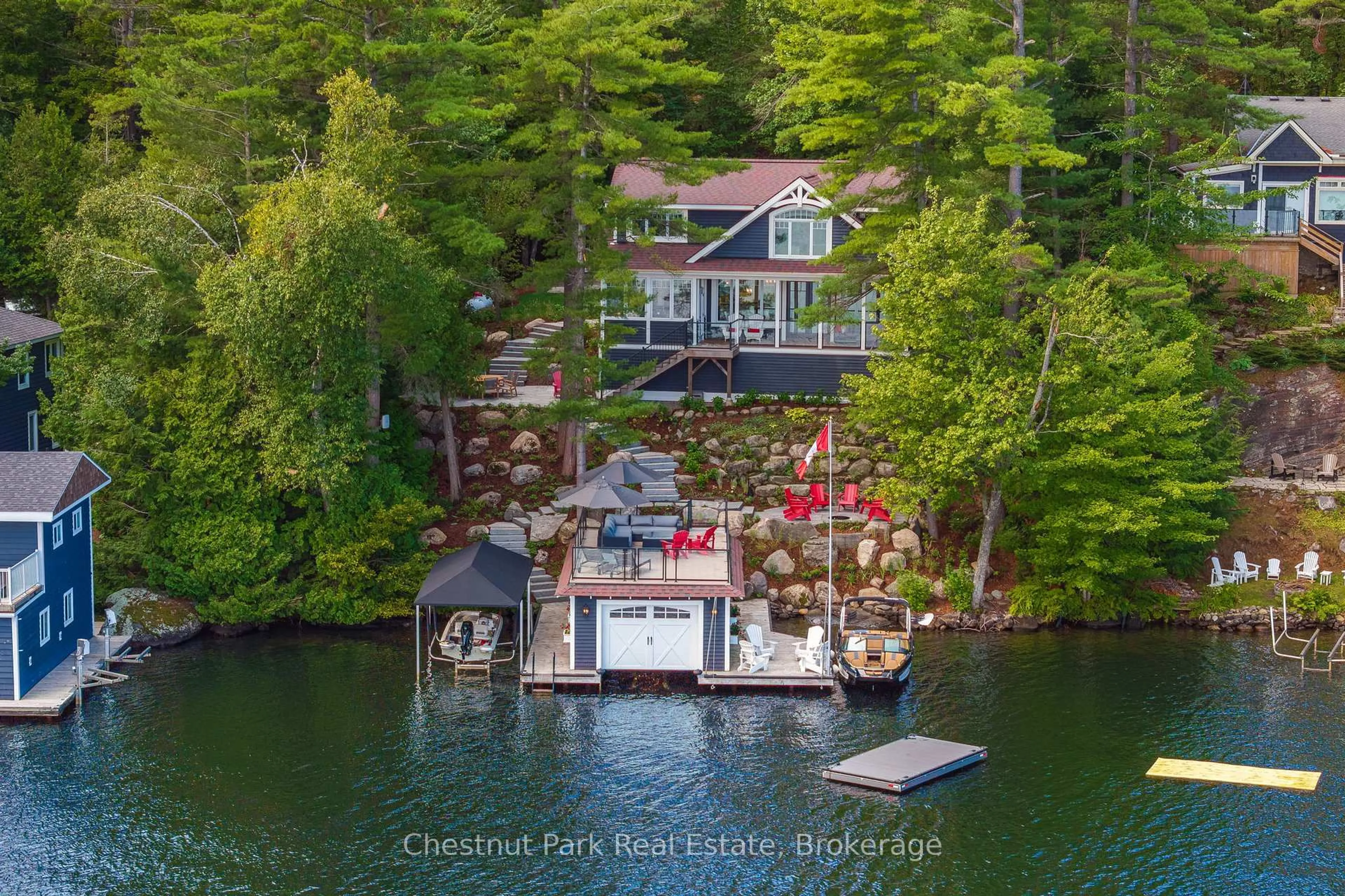 A pic from outside/outdoor area/front of a property/back of a property/a pic from drone, water/lake/river/ocean view for 1026 3300 Rd, Gravenhurst Ontario P1P 1R2