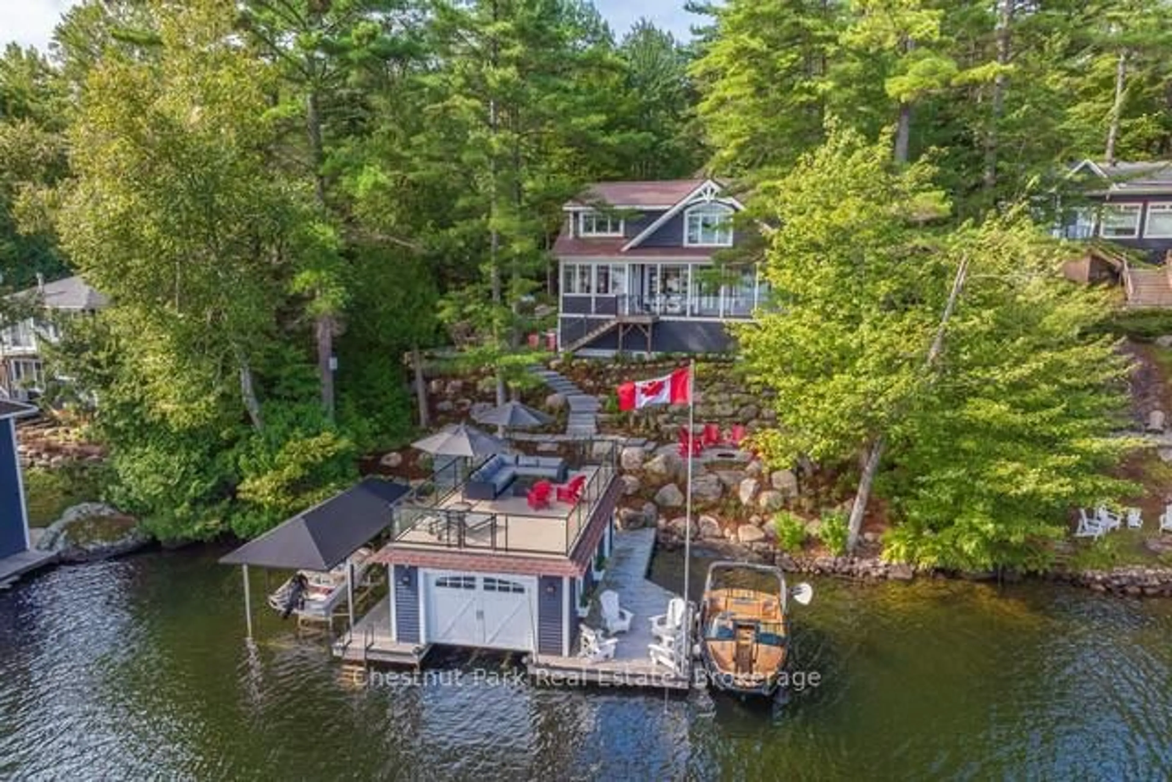A pic from outside/outdoor area/front of a property/back of a property/a pic from drone, water/lake/river/ocean view for 1026 3300 Rd, Gravenhurst Ontario P1P 1R2