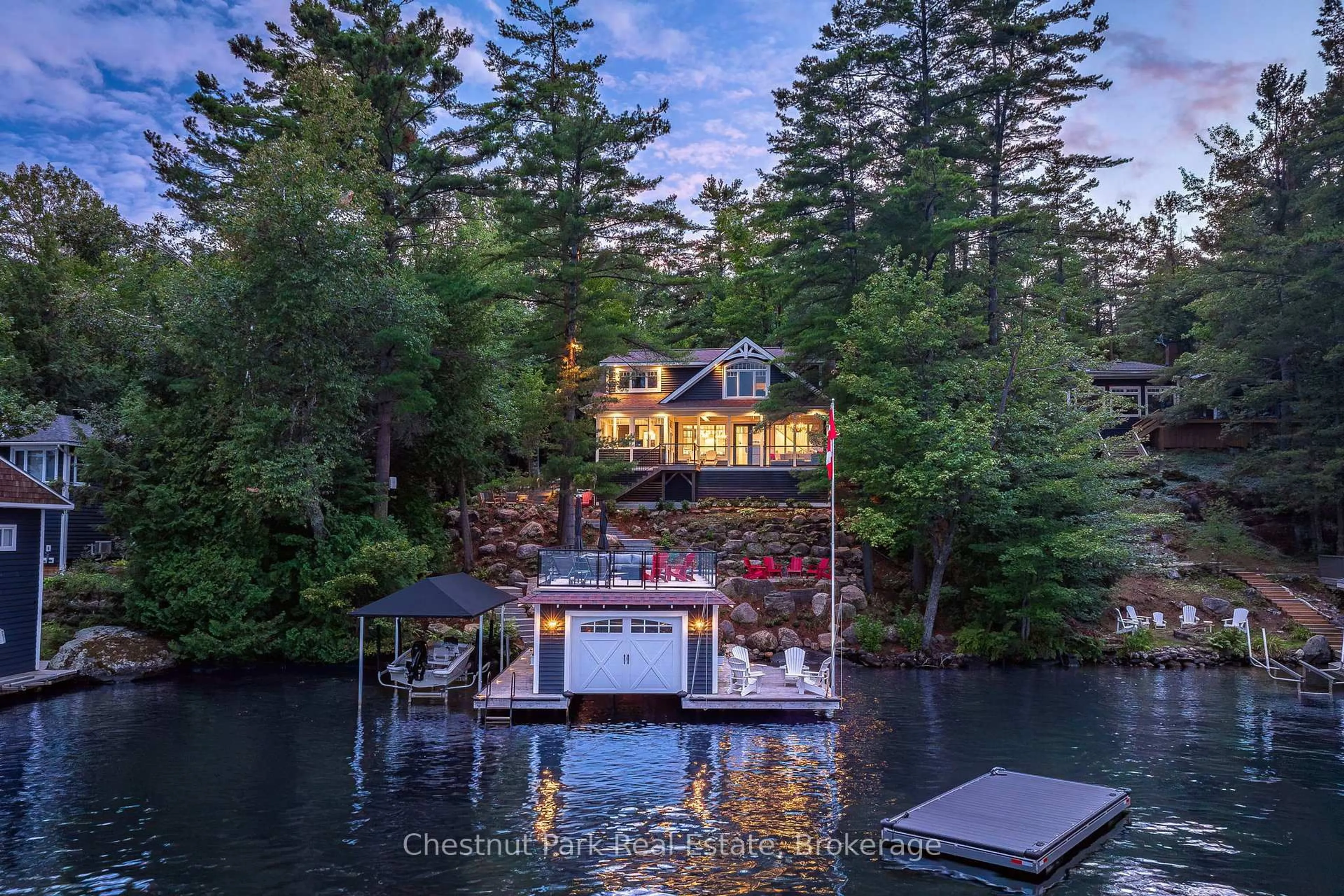 A pic from outside/outdoor area/front of a property/back of a property/a pic from drone, water/lake/river/ocean view for 1026 3300 Rd, Gravenhurst Ontario P1P 1R2
