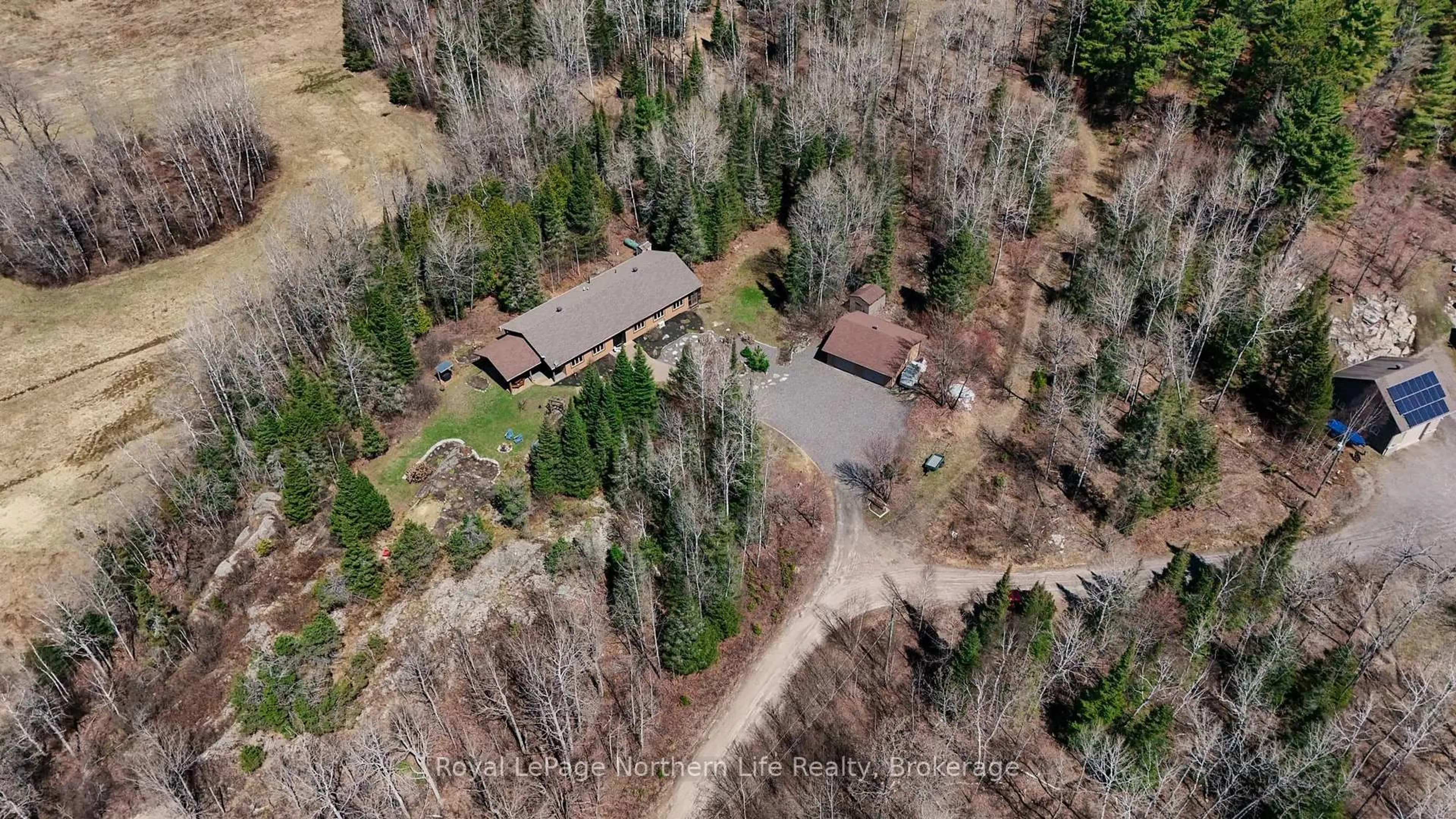 A pic from outside/outdoor area/front of a property/back of a property/a pic from drone, forest/trees view for 2642 A Highway 17, East Ferris Ontario P0H 1K0