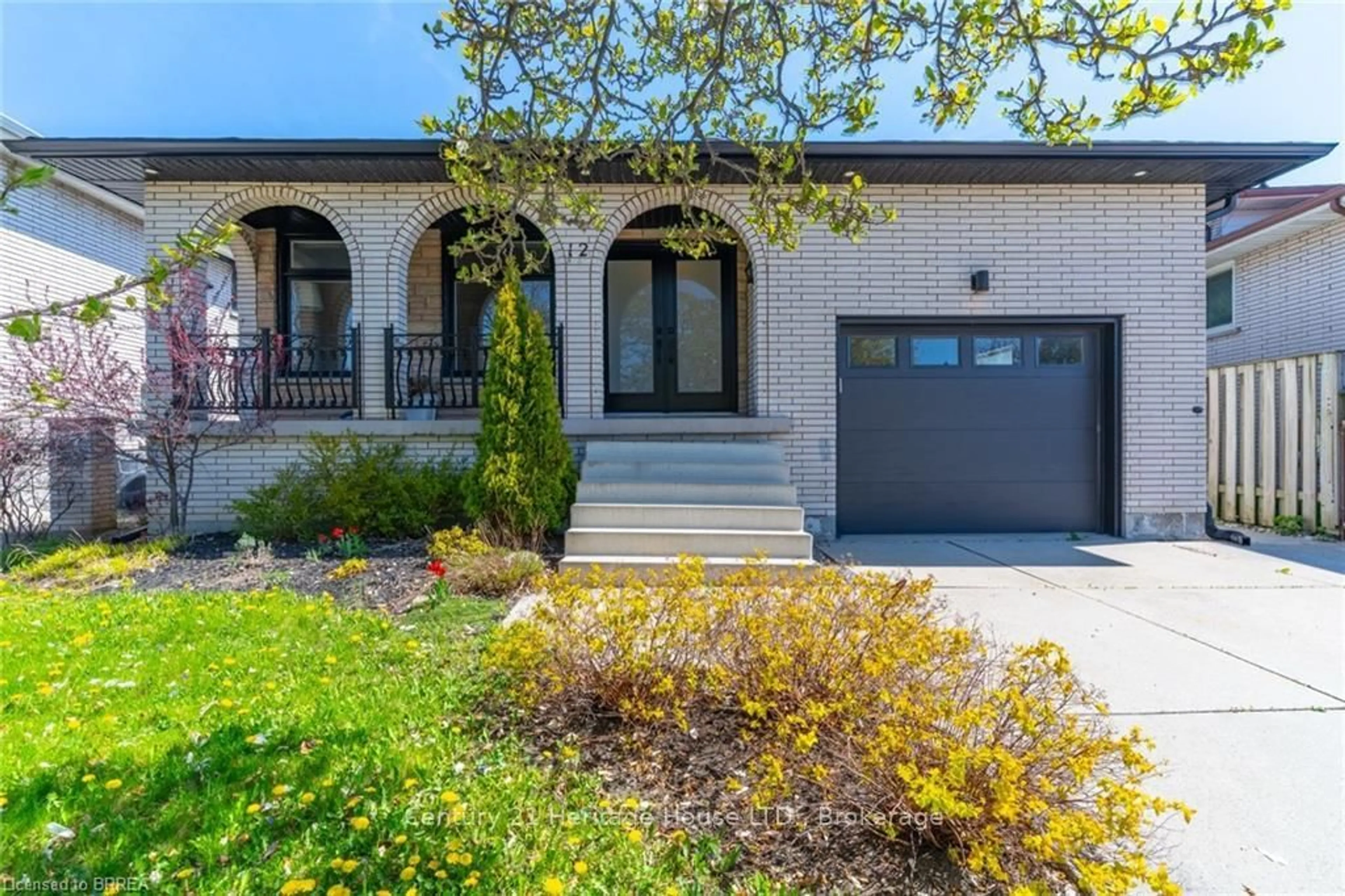 Home with brick exterior material, street for 12 Summerlea Dr, Hamilton Ontario L8T 4V5