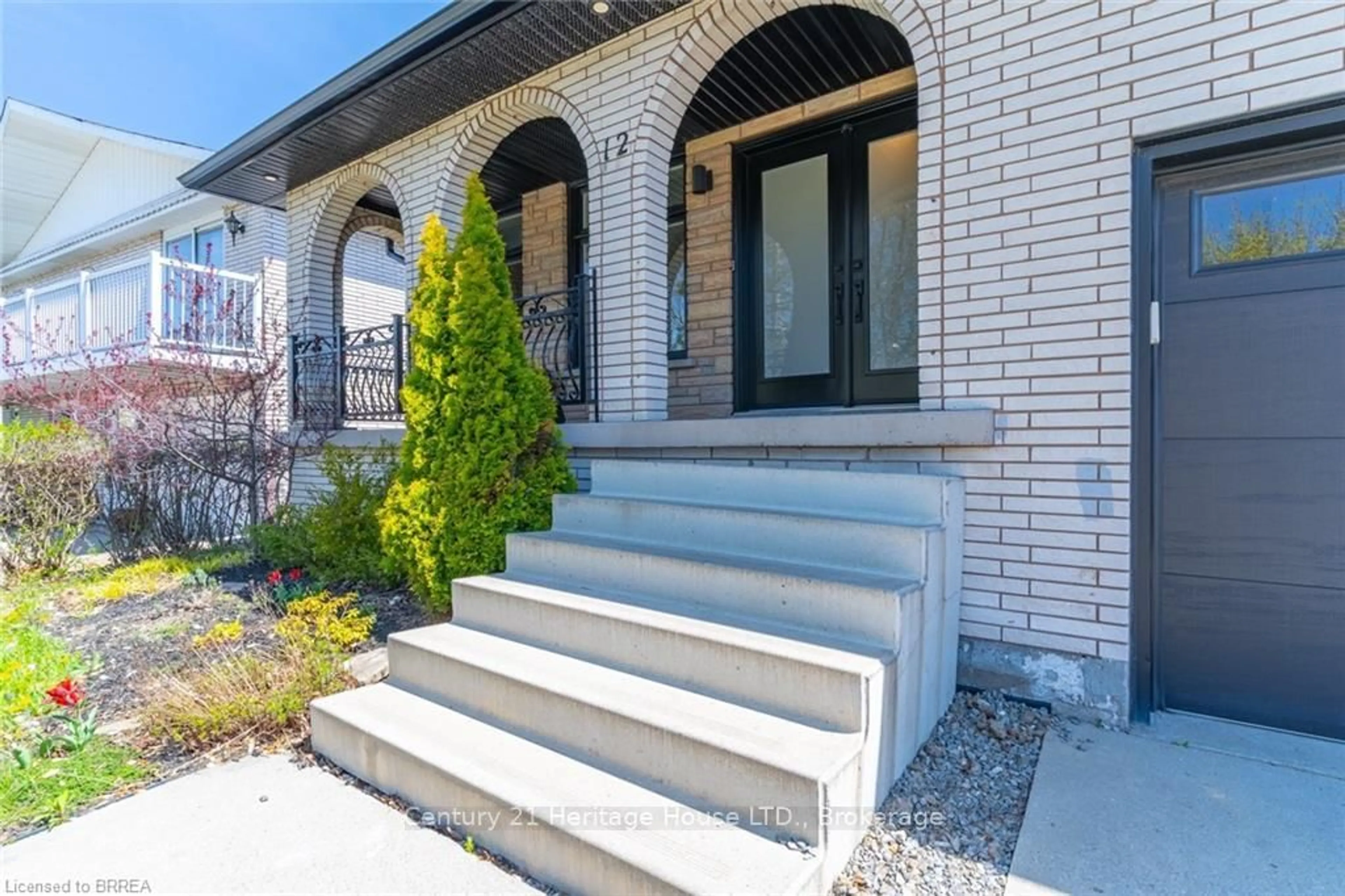 Home with brick exterior material, street for 12 Summerlea Dr, Hamilton Ontario L8T 4V5