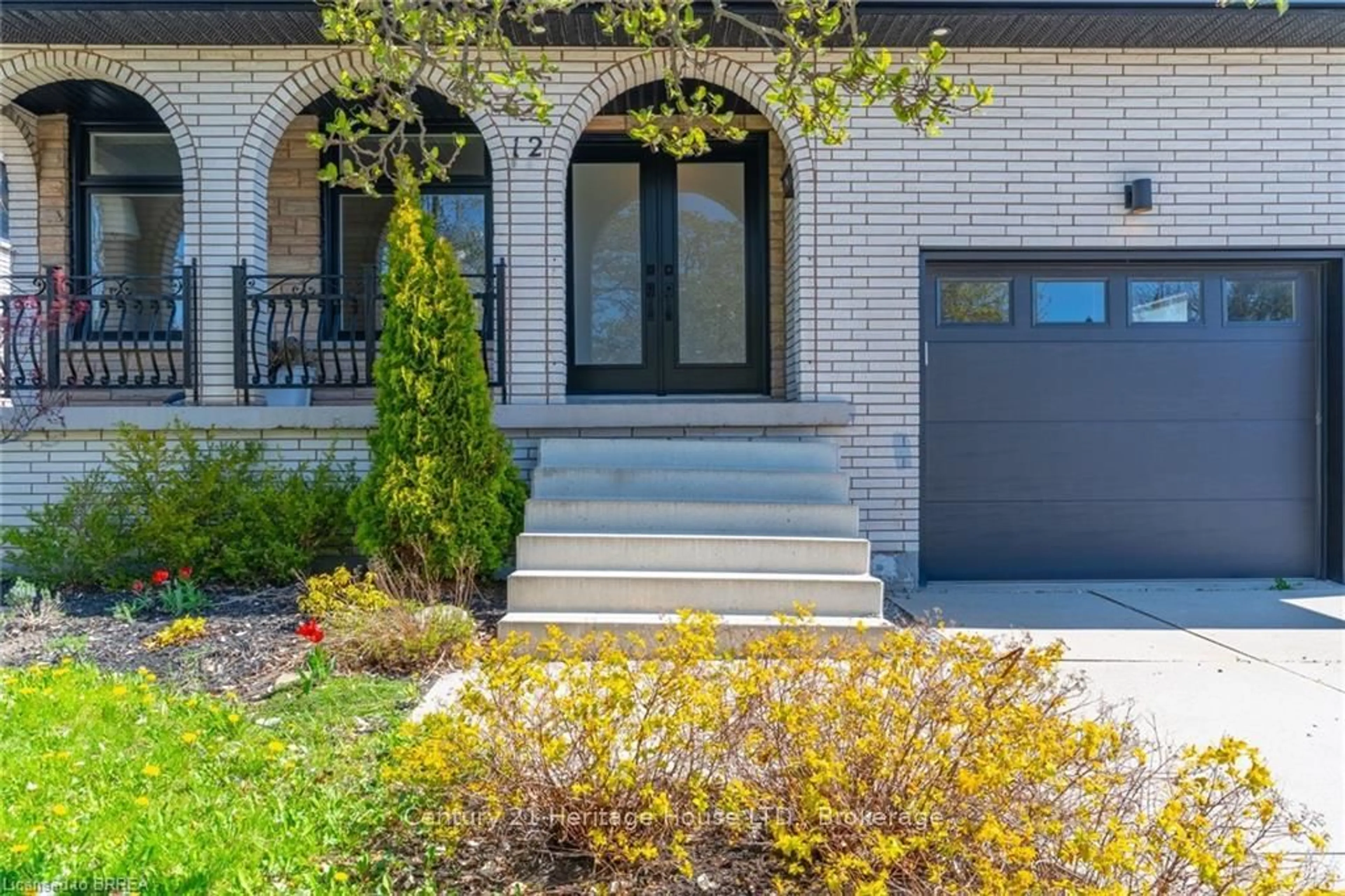 Home with brick exterior material, street for 12 Summerlea Dr, Hamilton Ontario L8T 4V5