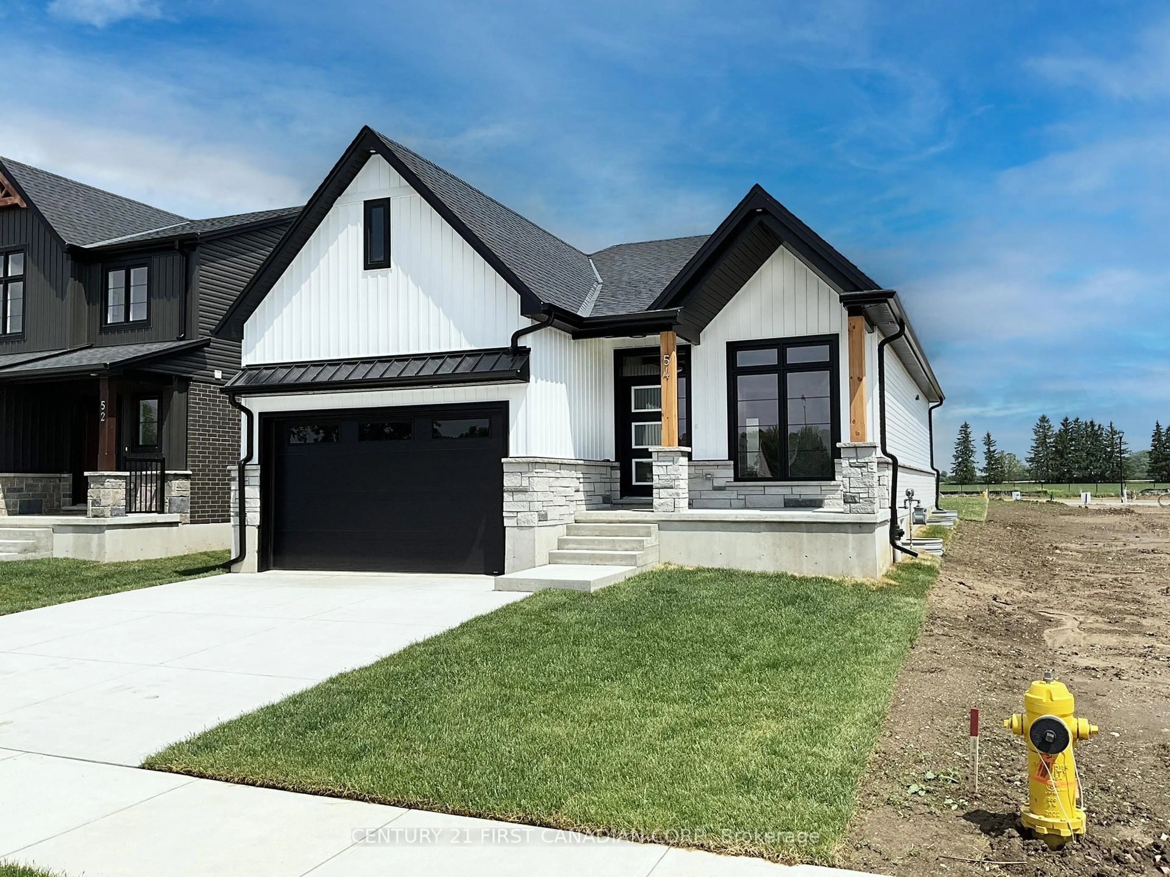 Home with brick exterior material, street for 7 POSTMA Cres, North Middlesex Ontario N0M 1A0